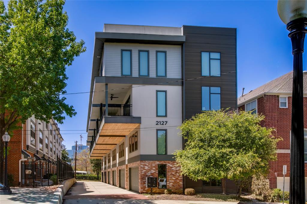 Discover the best of Dallas living in the heart of State Thomas, one of Uptown’s most sought-after and walkable neighborhoods. This beautifully appointed 3-bedroom, 2.5-bath townhome offers more than 2,200 square feet of sophisticated living space, combining modern design and an unbeatable location. Step inside to an inviting interior filled with natural light, warm hardwood floors and elevated finishes throughout. The open-concept living, dining and kitchen spaces create an effortless flow for both everyday living and entertaining. The kitchen is designed to impress with quartz countertops, Bosch stainless steel appliances and generous workspace, while designer lighting, plantation shutters and custom touches add character throughout the home. Upstairs, the spacious primary suite feels like a true retreat with a spa retreat bathroom and custom walk-in closet. Two additional bedrooms provide flexibility for guests, a home office or additional living space on a separate floor. Smart-home features, a tankless water heater and attached two-car garage add the convenience expected for today’s lock-and-leave lifestyle. Outside your door is what truly sets this home apart. Enjoy morning walks or afternoons at nearby Griggs Park, grab coffee around the corner, walk to dinner and drinks, or head to the Katy Trail. Whole Foods, McKinney Avenue, Uptown shopping and dining, Klyde Warren Park, the Arts District and Downtown Dallas are all just minutes away. Historic neighborhood charm meets modern Dallas living at 2127 Clark Street #103... a rare opportunity to live in the middle of it all without sacrificing space, style or comfort.