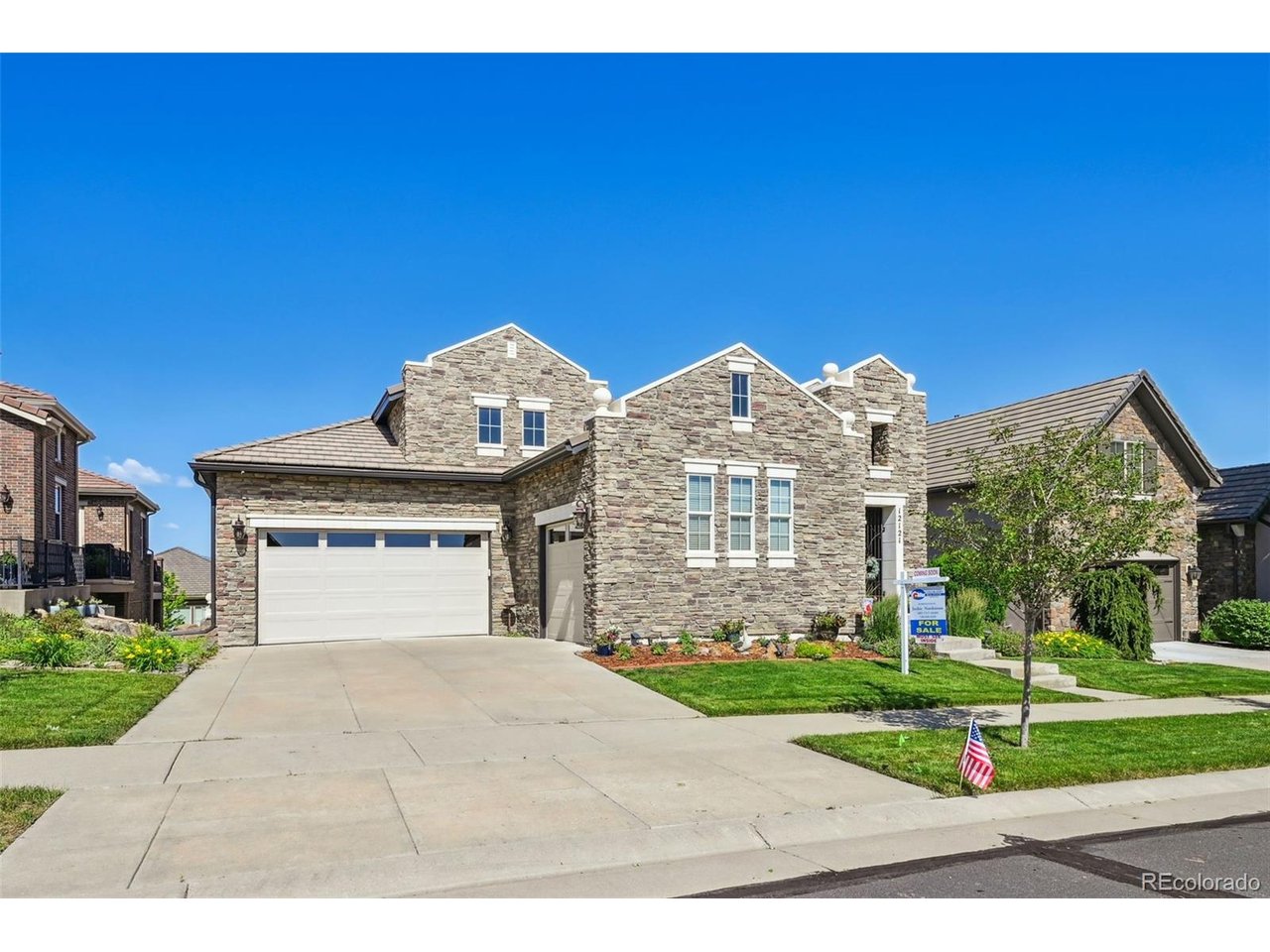 MOUNTAIN VIEWS, LOCATION, MAINTENANCE-FREE, MOVE IN READY! Nestled in the sought-after Country Club Highlands neighborhood, this STUNNING updated, open-concept, ranch-style John Laing floor-plan OFFERS 3 bedrooms, 5 baths, 3-car garage, finished walkout basement with AMAZING views of the full mountain range! Unobstructed views can be appreciated from the kitchen, great room, and primary bedroom. The spacious private gated front porch has a built-in outdoor gas fireplace, slate floors, and seating for entertaining. Located on the main floor is an office, the laundry room, a large dining room, a spacious great room that adjoins the large kitchen, and access to the outdoor upper deck. Brand new flooring and New paint/flooring on main level. The kitchen has been upgraded with stainless steel appliances, a gas cooktop, custom cabinets, granite countertops, double ovens, a walk-in pantry, a butler's pantry, and an oversized island, a chef's dream. The primary bedroom is quiet and features a luxury 5-piece bath, new flooring, and access to the deck. Secondary bedroom with a private ensuite. The basement features a large family room area, a wet bar, a 3rd guest bedroom, a gym/storage/craft room, a 3/4 bathroom, and a powder bathroom, providing a complete living space for an additional family member. The lower-level covered patio is another wonderful space for guests and pets. Upgrades throughout and NEW items include: tile roof, furnace, tankless water heater, interior and exterior paint, refrigerator, stove, and carpet. Fantastic community and all the amenities it provides, including a pool, remodeled clubhouse, tennis/pickleball courts, lawn/landscaping maintenance throughout the year, snow removal to your front door, and perfect "lock and leave". Close to walking/biking trails, Ranch Country Club & Legacy Ridge Golf Course, Hwy 287, Hwy 36, & I-25, walking distance to various restaurants, Hyland Hills Fitness, cleaners and other businesses.