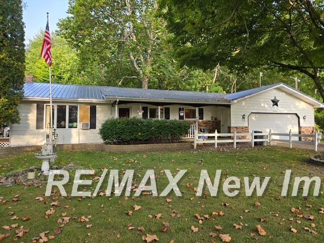 This a very rare opportunity to own a 96 acre wooded lot with road frontage on 3 roads.  The home itself is 3 bedrooms, 2 full bathrooms, full basement, and oversized garage that could fit 4 cars and a pole barn.  The home needs updating, such as flooring, paint, etc.  The metal roof is 3 years old.