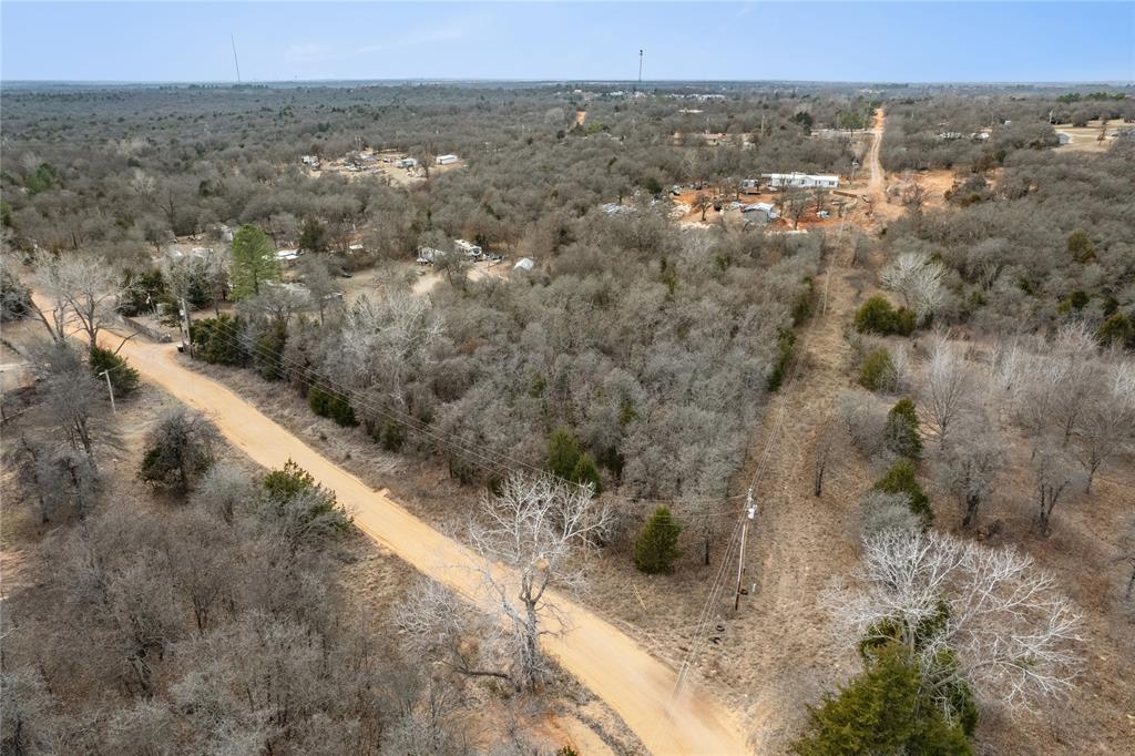 Discover the perfect blend of privacy and convenience with this beautiful 2.24 acres of secluded, wooded land. Tucked away for peaceful country life, this property offers the quiet retreat you’ve been searching for while still providing easy access to the main road for a smooth commute. Enjoy nature, wildlife, and wide-open skies, all just 2 miles from Lake Stanley Draper. Whether you’re looking to build your dream home or invest in a serene getaway, this property delivers the best of rural charm with nearby recreation and accessibility.