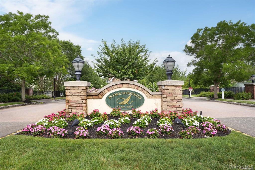 Welcome to Plymouth Estates in Mount Sinai – a beautifully maintained Ashby model lower end-unit in a highly desirable 55+ 24 hour gated community. This spacious 2-bedroom, 3-bath home offers elegant-lifestyle with a primary bedroom featuring an en-suite, a bright second bedroom, and a finished basement for additional living or entertaining space. Enjoy cozy evenings by the stone fireplace in the open-concept living room. This unit offers two patios, one off the kitchen with retractable awning and one off the back of the house. The community offers exceptional amenities including a clubhouse, outdoor pool, tennis courts, pickleball court, and putting green—perfect for active adults looking for lifestyle and leisure. With beautifully landscaped grounds and secure gated access, this home combines comfort, convenience, and peace of mind in a vibrant setting. Don’t miss the opportunity to enjoy low-maintenance living in one of Mount Sinai’s most sought-after communities!