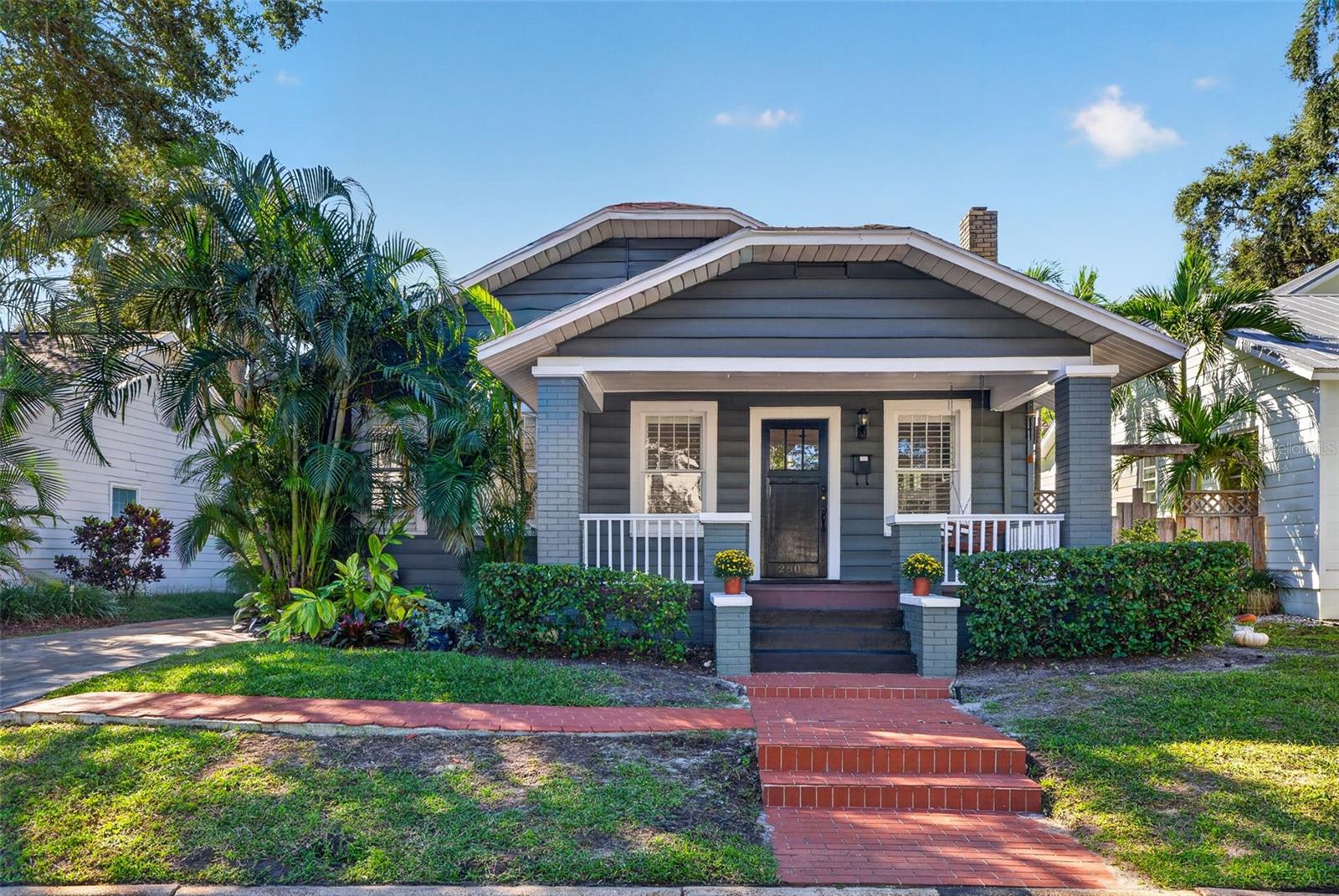 Under contract-accepting backup offers. If you love the charm of South Tampa, you’re going to love this one! Built in 1925, this 3-bedroom, 2-bath bungalow with a separate office offers 1,825 square feet on a picturesque brick-lined street in sought-after Palma Ceia, just 0.25 miles from Palma Ceia Playground. Step inside and the character is everywhere: wood floors, oversized crown molding, plantation shutters, a wood-burning fireplace, and original glass-front built-ins. The floor plan flows from a welcoming living room to a separate dining room and an updated kitchen, with inside laundry and natural gas. French doors open to a light-filled office, ready for working from home, a gym, or a playroom. The spacious primary bedroom features brand-new carpet and its own French doors out to the deck, along with an en suite bath with a double vanity. The backyard is what truly sets this home apart. A spacious wood deck, a paver patio for gathering, tropical landscaping, and low-maintenance turf with a putting green create a private retreat for weekend barbecues, dinners outdoors, practicing your short game, or simply relaxing in the Florida sunshine, with plenty of room to add a pool. Practical upgrades include a new water heater, an updated electrical panel, and a Level 2 EV charger. The home is zoned for Mitchell, Wilson, and Plant and located in flood zone X, where lenders typically don’t require flood insurance. Enjoy an unbeatable location close to Bayshore Boulevard, Palma Ceia Country Club, SoHo, and Hyde Park Village, with neighborhood favorites like 1983 and Cru just around the corner, plus easy access to downtown Tampa, International Plaza, and Tampa International Airport. Brick streets, classic architecture, an incredible backyard, and a prime South Tampa location make this a special find!