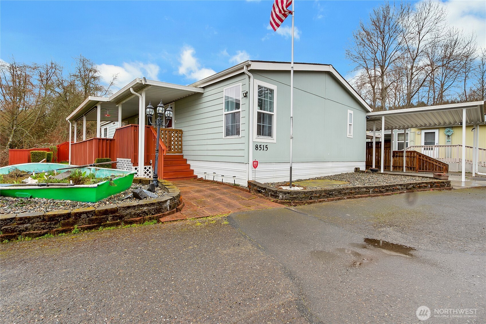 Welcome to your peaceful retreat! This immaculately maintained 3-bedroom, 2-bath home sits on a serene creek in quiet 55+ community Cherrywood Manor. Enjoy 1,512 sq ft of comfortable living with vaulted ceilings, large primary with ensuite bath and plenty of closet space, spcious kitchen with lots of cupboard/counter space and walk in pantry,  light and bright living room, open and inviting family room, laundry/mud room, large 2-car carport and two handy storage sheds. This home also offers a heat pump for cooling on those warm summer days, generator switch and water filtration system.  Enjoy the huge covered deck all year long and watch birds, fish, and wildlife right from your own backyard—nature and comfort in perfect harmony.