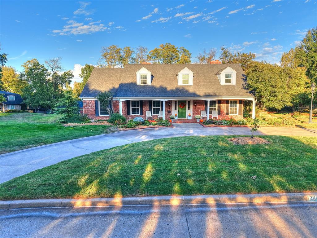Welcome to one of the most picturesque homes in Norman. Truly a rare opportunity to call this property home, where classic charm, warmth, and timeless design converge on a street where properties seldom come to market. The postcard curb appeal and terraced greenbelt lawn creates a serene, park-like oasis within the neighborhood. Step inside to an open yet thoughtful layout where natural light greets you through expansive windows, beautifully highlighting the stunning wood floors and coffered wooden ceilings. Designed effortlessly for both grand entertaining and comfortable everyday living, the main level features large, open rooms anchored by a spacious open kitchen and an elegant formal dining room. Despite the home's open and airy feel, quiet private nooks are tucked throughout, offering peaceful retreats to sip morning coffee or lose yourself in a good book. Spacious bedrooms with full bathrooms plus two convenient half baths make this ideal for families and guests. Adding incredible versatility, the property includes a basement apartment ideal for multi-generational living, extended-stay guests, or a private home office. Situated within an easy walk to the local elementary school and nestled in one of the area’s most sought-after enclaves, this extraordinary property presents an irreplaceable blend of luxury, location, and functional design.