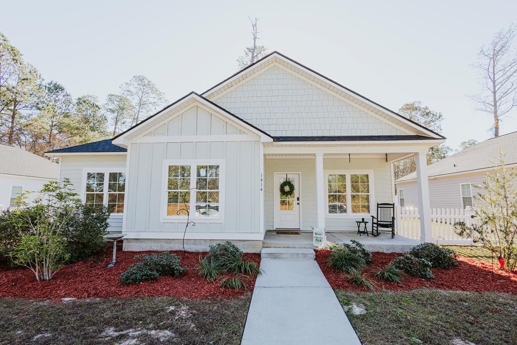 Discover the perfect blend of modern convenience and Southern charm at 1414 Sally Street. Built in 2021, this stunning cottage style home offers a "better-than-new" living experience without the wait of construction. Located just moments from schools, shopping, and the historic streets of downtown Thomasville, this home is a turnkey gem in the "City of Roses." Step inside to a light-filled interior featuring high, trey ceilings and recessed lighting that create an airy, spacious atmosphere. The open floor plan flows seamlessly from the living area to the kitchen—ideal for entertaining. The heart of the home features hard-surface countertops, ample cabinetry, a dedicated pantry, and a dining combo area perfect for morning coffee or family dinners. Relax in the private main-level master suite, boasting a spacious layout and an en-suite bath equipped with double vanities and a beautiful walk-in shower. Minutes away from local grocery stores, ball fields, and parks. Enjoy quick access to everything Thomasville has to offer while tucked away on a quiet street. Call today to schedule your showing!