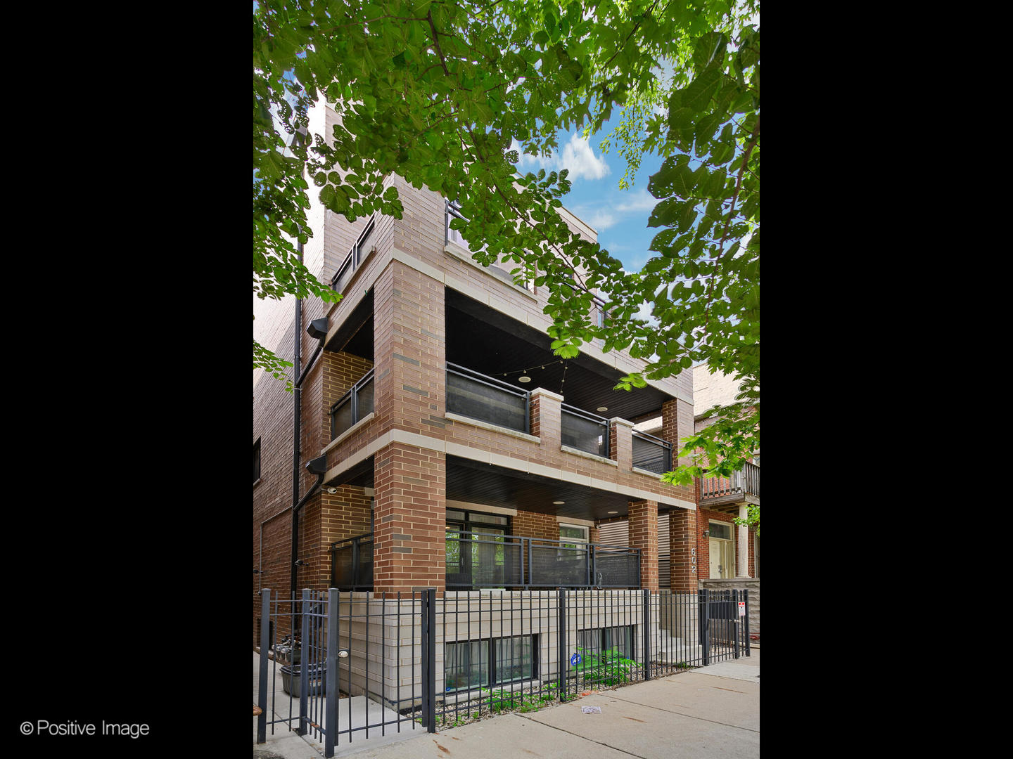 Better than new construction, this highly upgraded 3 bed, 2.5 bath duplex-up is perfectly situated on a quiet, tree-lined street in West Town. The jumbo floor plan is flooded with natural light from east, west, and south exposures and features hardwood flooring throughout, two expansive living spaces, and a convenient powder room on the main level.  A striking Copat Italian kitchen anchors the main level, complete with quartz countertops, a marble backsplash, Thermador appliances, and an oversized island, while a custom wine cellar adds an elevated touch. Upstairs, three spacious bedrooms, a full bath, and a laundry room are joined by a luxurious primary suite with wall-to-wall custom closets and a spa-like ensuite bathroom featuring a steam shower and soaking tub.  Crowning the home is a fully private, magazine-worthy roof deck designed for year-round enjoyment. Multiple lounging and dining areas, a custom outdoor kitchen and bar with all-season appliances, double pergolas, Trex decking with pavers, a fire pit, custom lighting, and a grassy play area create the ultimate retreat-all framed by sweeping, unobstructed views of Fulton Market and the Chicago skyline.  Garage parking and additional storage are included. With quick access to Fulton Market, West Loop, SoHo House, Time Out Market, JP Graziano's, Whole Foods, Nobu, the CTA Blue Line, and 90/94 & 290, this home offers both tranquility and connectivity in one of Chicago's most vibrant neighborhoods.