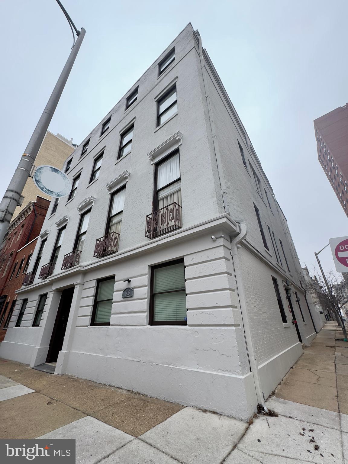 Welcome to 505 Park Ave – Unit 3B, Baltimore, MD 21201, a distinctive city apartment in one of downtown Baltimore’s most convenient locations. This residence offers a bright open layout, high ceilings, and striking interior details, creating a space that feels both stylish and comfortable for everyday living.Inside the apartment, you will immediately notice the combination of smooth finished walls and exposed brick accents, giving the home a unique urban loft style. The wood flooring and neutral color palette provide a warm and versatile foundation that complements a variety of décor styles. Large tall windows allow abundant natural daylight to fill the home, enhancing the open and airy atmosphere throughout the living spaces.The living area offers a comfortable setting for relaxing or entertaining. With wood flooring and generous natural light, the space feels welcoming and easy to personalize. The open layout connects seamlessly to the rest of the home, creating a smooth flow that maximizes the sense of space.The kitchen combines functionality with a modern look. It features granite countertops and stainless steel appliances, providing both durability and style. The kitchen is equipped with a stove and oven, refrigerator, microwave, and dishwasher, giving residents everything needed for convenient meal preparation and everyday cooking.Both bedrooms are designed to be spacious and inviting. The primary bedroom features wood flooring, neutral tones, high ceilings, and large tall windows that allow plenty of natural light to enter the room. A dedicated closet offers storage while maintaining the clean and open feel of the space.The second bedroom continues the same bright and comfortable design with wood flooring, neutral colors, high ceilings, and a large tall window that fills the room with natural daylight. It also includes a closet, making it ideal as an additional bedroom, home office, or creative workspace.The bathroom features a walk in shower, lavatory, cabinet storage, and a vanity mirror, offering a clean and functional space designed for daily routines.For added convenience, the apartment includes in unit laundry with a washer and dryer, allowing residents to manage laundry comfortably from home.With its high ceilings, exposed brick details, large windows, and open layout, 505 Park Ave – Unit 3B offers a living space that captures the character of historic Baltimore while delivering modern comfort. Its downtown location places you within easy reach of dining, entertainment, and cultural destinations throughout the city.Nearby Landmarks and Attractions• The Walters Art Museum• Maryland Institute College of Art (MICA)• Baltimore Symphony Orchestra at Joseph Meyerhoff Symphony Hall• Inner Harbor• CFG Bank Arena• Baltimore Convention Center• Lexington Market• Oriole Park at Camden Yards• Mount Vernon Cultural DistrictIf you are searching for a light filled apartment with architectural character and a prime city location, 505 Park Ave – Unit 3B is a standout opportunity in Baltimore’s rental market.Monthly Water Fee: $35.00 per occupantPets are allowed with a pet addendum, a $500 non-refundable pet fee, and a $25 monthly pet rent per pet.Rental License No.: L-516170Agency disclosed upon initial contact. Agent conducts showings; BMG manages follow-up, paperwork, move-in post-approval. Vouchers work with BMG directly.