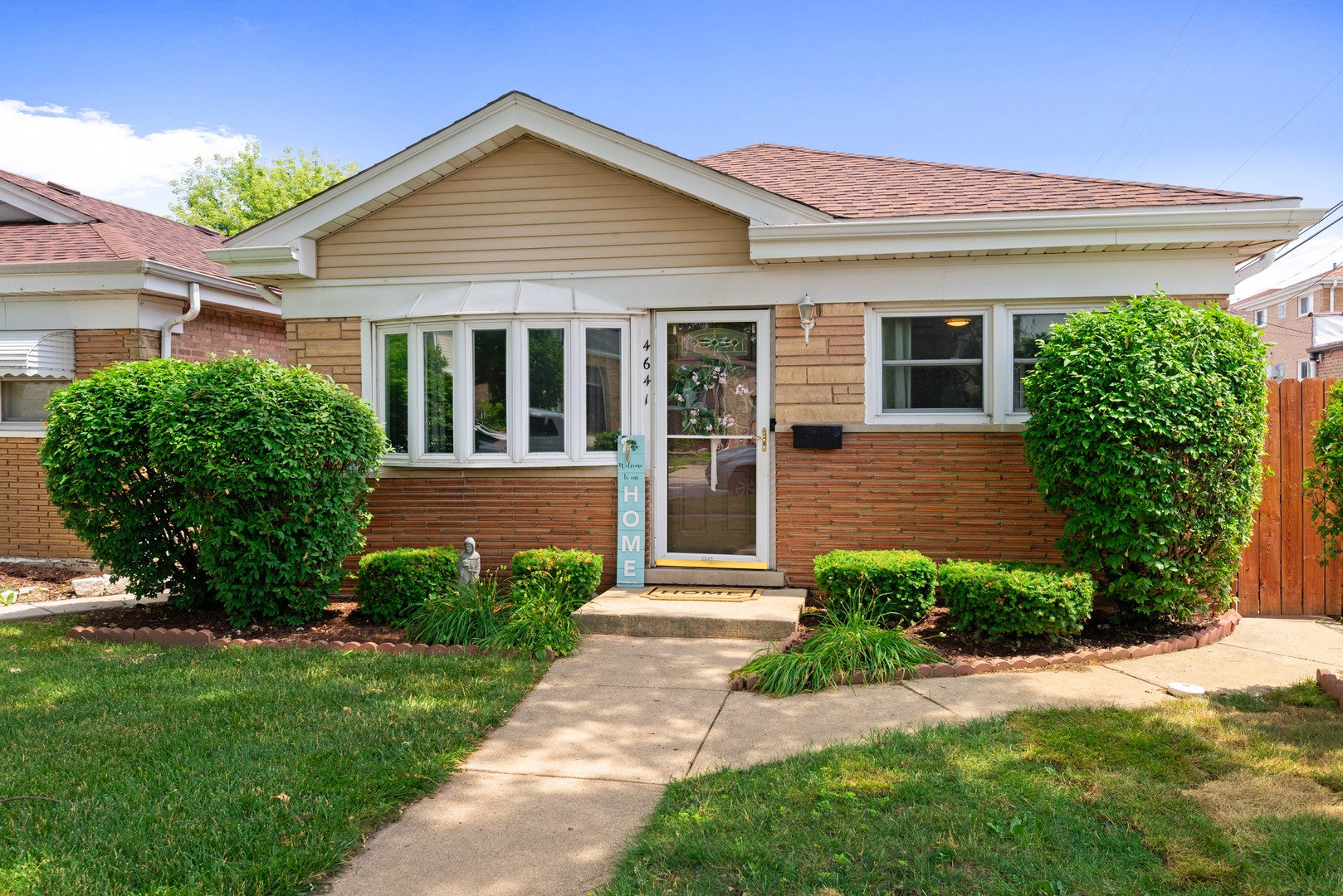 Welcome to this charming 3-bedroom single-family home, located on a tree-lined residential street in Lyons. This home offers comfortable living with newer flooring throughout most of the home, recessed lighting, and energy-efficient vinyl windows. The main level features two bedrooms and a bright living room highlighted by a beautiful bay window that brings in abundant natural light. Step outside to a spacious, fully fenced yard, perfect for entertaining or everyday enjoyment, with a patio, lawn, and playground set. A detached 2-car garage with convenient alley access provides ample storage and off-street parking. Ideally situated near parks, schools, and local amenities, this home offers an excellent opportunity to experience a vibrant and welcoming community. Sold as is.