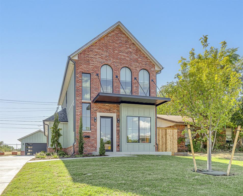 Brand new. Beautifully designed. Right where you want to be.Built in 2026 and located less than a mile from OU and the Gaylord Family–Oklahoma Memorial Stadium, this 4-bedroom, 3.5-bath Norman home brings a whole lot to the table. Never previously occupied and set to welcome its first short-term rental guests in the near future, it offers an intriguing investment opportunity while being equally suited to life as a beautiful home.Inside, the open-concept floor plan is filled with natural light, gorgeous finishes, and custom details. The kitchen features a large island with bar seating, stainless steel appliances, abundant storage, and plenty of workspace, while the tucked-away breakfast nook adds a fun touch with built-in bench seating and its own wall of windows.The first-floor primary suite offers privacy with an en suite bath featuring a double vanity, glass-enclosed shower with custom tile work, and huge walk-in closet. A convenient half bath completes the main level.Upstairs, one bedroom has its own full bath and walk-in closet, while two additional bedrooms share a beautifully finished hall bath. The flexible layout makes hosting guests—or a crowd on game weekends—a breeze.Outside, the red brick exterior, arched second-story windows, covered front porch, and covered back patio give this brand-new home plenty of character. A detached two-car garage adds even more functionality.Thoughtful extras include R-40 attic insulation, spray-on wall insulation, surround sound, security, and high-end exterior doors.Brand-new construction, custom finishes, an unbeatable Norman location, and the flexibility to live in it or rent it out. This one is a little different—and that's a very good thing.