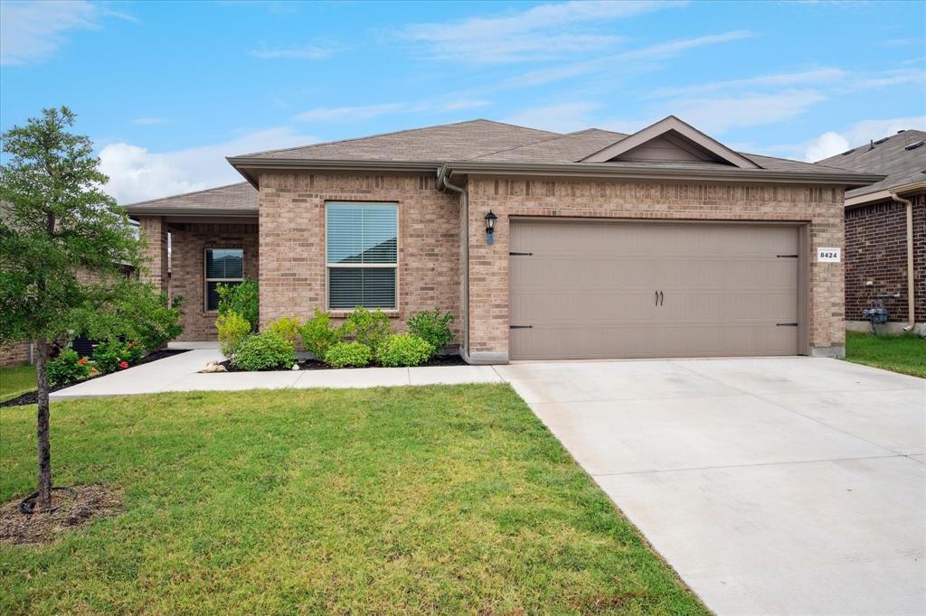 Stunning 2023-built home in highly sought-after Eagle Mountain-Saginaw ISD! This property combines modern design, energy efficiency, and an ideal location for today’s busy lifestyle. With 4 spacious bedrooms, a dedicated home office, and a 2-car garage, this layout offers room to live, work, and grow. Step inside to an open-concept floor plan filled with natural light. The chef’s kitchen features stainless steel appliances, a gas range, and a walk-in pantry—perfect for everyday cooking or entertaining friends and family. The living and dining spaces flow seamlessly to a covered back porch with an eastern exposure, overlooking a peaceful greenbelt—an inviting spot to enjoy shaded afternoons and quiet evenings.
The private owner’s suite offers a spa-like bath and generous walk-in closet, while secondary bedrooms are well-sized for family, guests, or hobbies. Built in 2023, this home provides modern finishes, smart energy-efficient systems, and low-maintenance living.
Located in a prime area with easy highway access, you’ll enjoy quick commutes throughout the DFW Metroplex. Nearby are top-rated schools, shopping, dining, and entertainment, making this home the perfect blend of convenience and comfort.
Don’t miss your chance to own a move-in-ready home in a growing community where quality, location, and lifestyle come together beautifully. Schedule your private showing today!