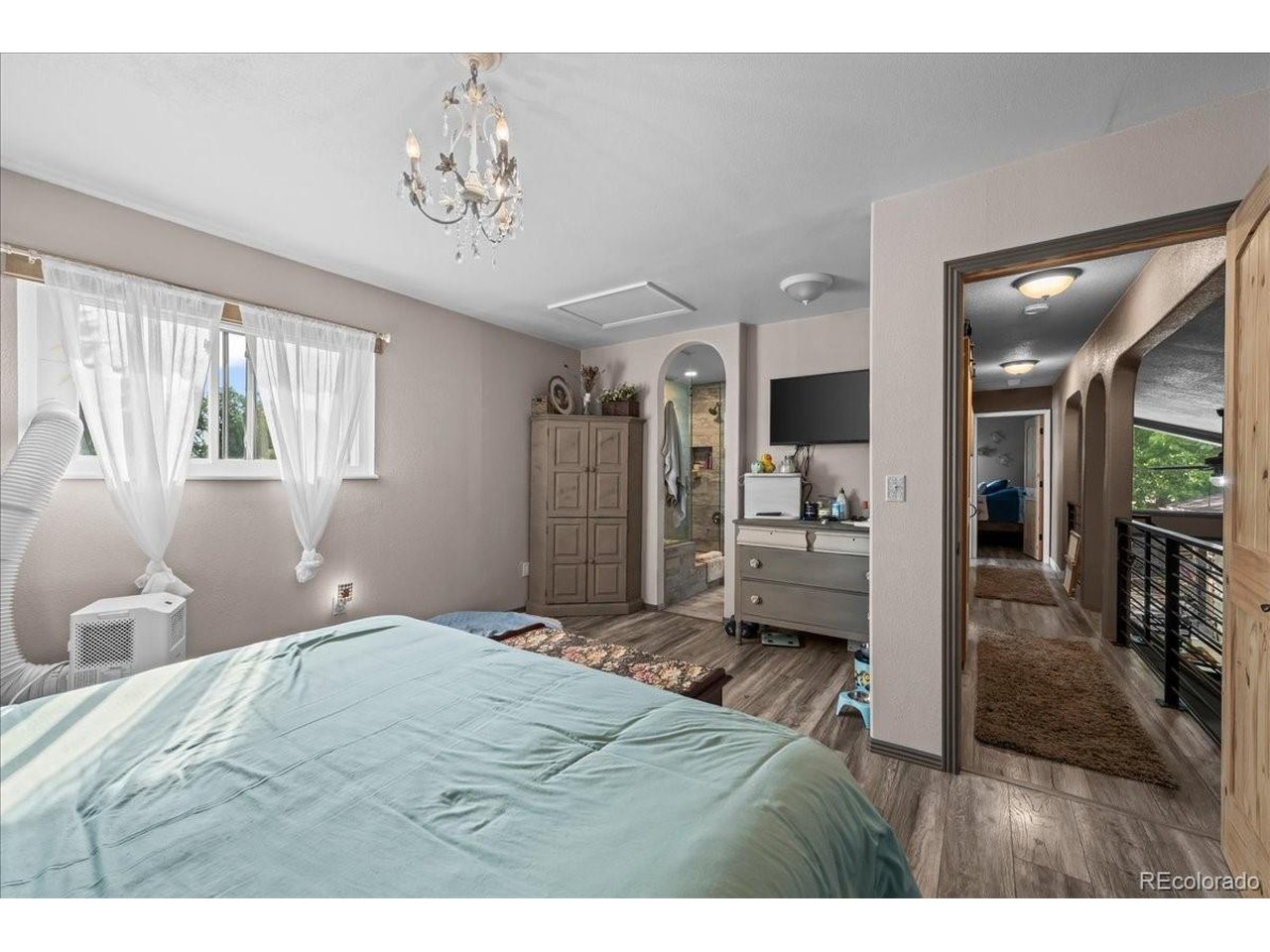 MOTIVATED SELLER! MOVE-IN READY! SELLER OFFERING $15k TOWARDS RATE BUY DOWN AND/OR CLOSING COSTS. New roof, oversized corner lot, rare detached 26x24 2-car garage/workshop, RV parking, and no HOA or metro tax-just minutes from Waneka Lake! This inviting front to back tri-level home offers great curb appeal, mature landscaping, and a spacious backyard designed for relaxing and entertaining. The front porch welcomes you into a spacious main level featuring high ceilings, laminate wood flooring, and a cozy living room with wood-burning fireplace. The updated kitchen and dining area showcase warm wood tones, stainless steel appliances including a double oven, tile backsplash, butcher-block countertops, and access to the backyard. Upstairs are three bedrooms and a beautifully updated bath with fully tiled walk-in shower and creative linen storage. The naturally light-filled lower level features a large family room, additional updated bath, spacious laundry room, walk-in closet, and ample storage. The expansive backyard provides room for a fire pit, hammocks, patio seating, and outdoor gatherings, with a walkway leading to the oversized detached garage/workshop. Additional updates include newer vinyl siding, windows, light fixtures, new sewer line and cleanout, and new electrical panels for the home and garage. Conveniently located near Waneka Lake, Old Town Lafayette, shopping, dining, and more-this home offers modern updates, exceptional space, and versatility in a fantastic location!