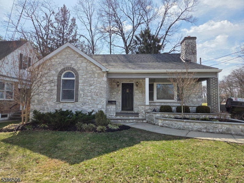Fully renovated and move-in ready! This beautifully "just" updated home in the heart of Garwood is located on a quiet street backing directly to beautiful Unami Park - offering the perfect blend of peaceful living and convenience. Renovated in 2025/2026, every surface has been freshly painted, with new light fixtures, ceiling fans, and updated outlets throughout. The stunning new white shaker kitchen features all new appliances, quartz countertops, a stylish tiled backsplash, skylight, and brand-new hardwood floors extending into the formal dining room. The first-floor full bath was previously completely renovated, showcasing modern tile work and a tub/shower combo. Enjoy relaxing on the open, covered front porch, take advantage of a large full basement with a one-piece lav that can be finished with backyard access, and appreciate the space and storage of an oversized two-car garage. Just 7 blocks to downtown Garwood, NYC train and bus lines, shops, and dining. This is a rare opportunity in a prime location...Priced to sell. Hurry! Don't miss it!