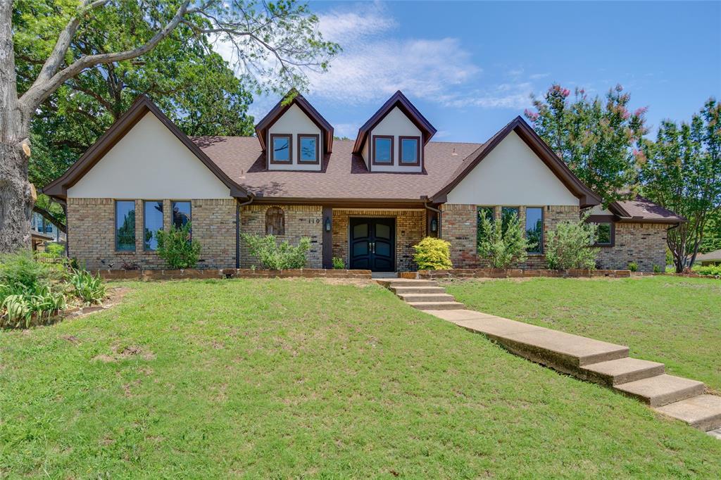 This beautifully updated 2 story home in Trophy Club has all the luxury upgrades you're looking for. The kitchen has a stainless steel appliances, double oven, beautiful tiled backsplash, and white cabinets. The primary bathroom has dual sinks, a garden tub, and a standing shower. The main living area has a grand fireplace with wooden beams on the ceiling and custom builtins. The upstairs entertainment area features a pool table, wood stove, and a wet bar. The extra large laundry room has a sink and storage area. There is a 3 car garage that faces the side of the home. No hoa. Come check it out today!