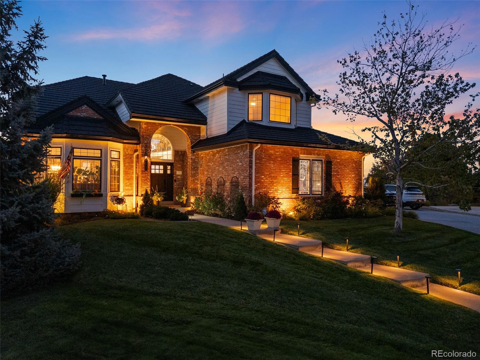 Backs to Open Space | Mountain Views | Saltwater Pool | Cul-de-Sac LocationTucked away on a quiet cul-de-sac in Highlands Ranch, this beautifully updated home offers rare privacy backing to open space, spectacular mountain views, and unforgettable sunset skies from the upper deck. Ideally located within walking distance to schools, shopping, and the Northridge Recreation Center, with quick access to I-25 and C-470 for an easy commute.Inside, the home is filled with abundant natural light and a functional layout designed for everyday living. The upper level features four bedrooms, including a spacious primary suite, keeping the whole family together on one level. Multiple living areas provide flexibility for entertaining, relaxing, or working from home.The backyard is built for Colorado living with a saltwater pool, hot tub, mature fruit trees, and open space backdrop creating a private outdoor retreat. Whether hosting summer gatherings or enjoying quiet evenings, the setting offers both tranquility and convenience.Extensive recent updates provide peace of mind and modern finishes throughout. Major improvements include a Unified Steel stone-coated 50-year roof and gutters, new perimeter fencing, full exterior repaint, saltwater pool cover, heater and pump (2023), and a new cement driveway (2025). Interior upgrades include new carpet in bedrooms, luxury vinyl plank flooring, remodeled basement bath, remodeled main floor bath, updated laundry room, new appliances, new front entry door, and a new water heater (2024).A rare opportunity to own a move-in ready home with mountain views, open space, and exceptional outdoor living — all in one of Highlands Ranch’s most convenient and desirable locations.