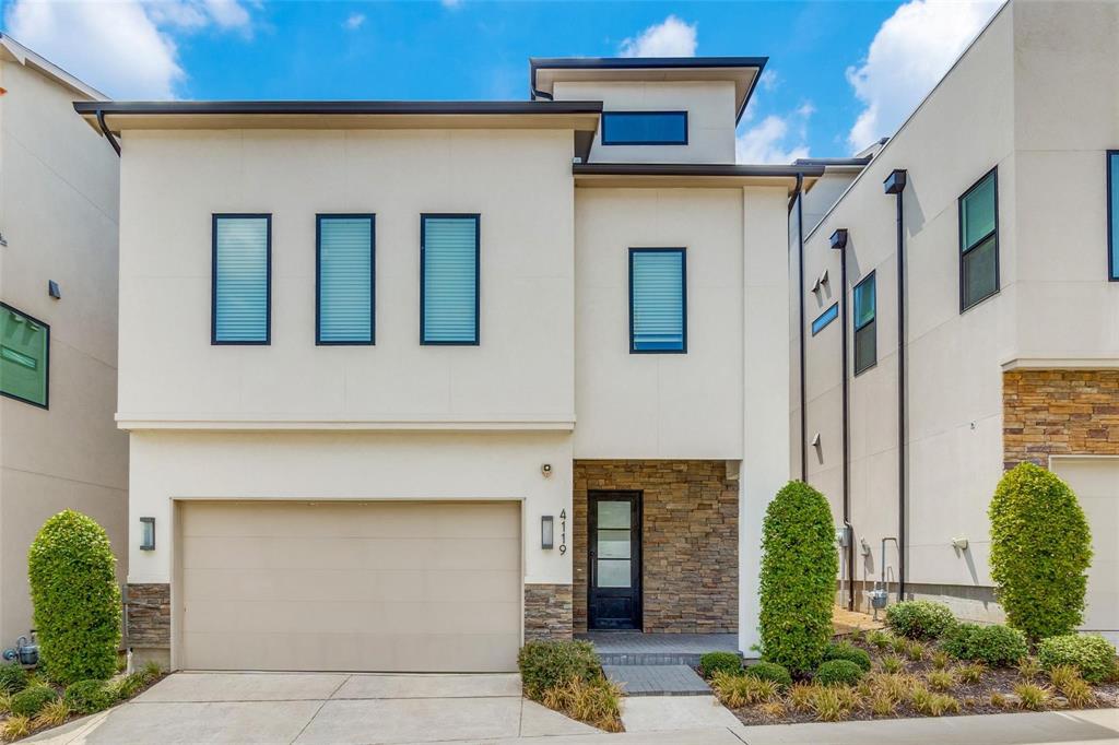 COME HOME to this Beautiful craftsmanship in a small community of 30 homes perfectly situated in between Uptown and Medical District. Elevated just over the city with fantastic downtown views from your furnished roof top patio. Beautiful design with natural dark hardwoods, quartz counters, open kitchen large island, natural light in living and gas cooktop and fireplace. Large master bath with garden pedestal footed tub and separate walk in shower. Nice size bedrooms and WD included. Lovely backyard with covered sitting area and furniture.