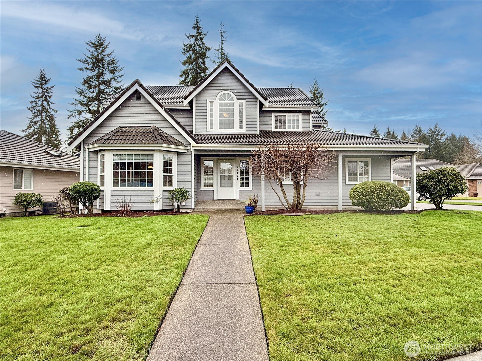 Beautiful 4 bedroom home on a quiet cul de sac in Campus Park. You're welcomed by a covered walkway leading to the front door. Inside the home you are met with a vaulted entry and new luxury vinyl plank flooring. Wood wrapped windows and walkways throughout the home. Traditional main floor layout offers a vaulted formal living room, formal dining room with tray ceiling and wainscoting, and open concept kitchen and family room. Kitchen has been updated with quartz counters and stainless steel appliances. Center island with cooktop allows for eat in dining and is great for entertaining. Family room includes gas fireplace and french doors to the backyard. A spacious powder room and the laundry room complete the main level. Upstairs you will find 3 generous guest bedrooms and guest bath with skylight, plus the primary suite. Primary suite offers plenty of space for a king bed plus all of your bedroom furniture, a walk in closet, and a 5 piece en suite bathroom with soaking tub and separate shower stall plus dual sink vanity. Outside the home you can enjoy outdoor living in the backyard on the extensive composite deck with built in privacy fencing Small grassy area is low maintenance and perfect for pets or play area. 3 car garage and large driveway offer plenty of parking and storage space. Year round heating and cooling comfort provided by the heat pump.