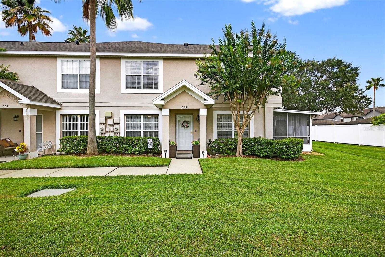 Under contract-accepting backup offers. Enjoy instant peace of mind with a new 2025 roof and an updated 2021 water heater in this bright, corner end unit. 1,159 sq ft with two bedrooms and two and a half baths, this move in ready townhome sits inside a quiet, gated community at the very end of a dead end road, so there is no through traffic, only residents and guests. The corner lot adds extra privacy and a wide stretch of green space along the side and rear. Step onto the welcoming covered front porch and into a light filled living room with a large front window and smooth flow to the formal dining room. A pass through serving window connects the dining area to the kitchen, which features granite countertops, a mosaic tile backsplash, two tone cabinetry with modern hardware, stainless steel appliances, pendant lighting, and a deep double sink with a pull down faucet. Sliding glass doors open to a roomy screened lanai with a ceiling fan and wood look flooring, an inviting spot for morning coffee or evening unwinds overlooking the lawn. A convenient half bath completes the first floor. Upstairs, two generously sized bedrooms await. The primary suite includes a walk in closet and an ensuite bath with a tub and shower combo and a stone accent wall. The guest bedroom offers a built in closet and sits just steps from the second full bath. A laundry closet with a full size dual washer dryer in one is also located on the second level. Community perks include a sparkling pool, sidewalks, and plenty of space for walking, jogging, or biking, with quick connections to Brandon Parkway and nearby trails. Despite the tranquil setting, you are close to the Selmon Expressway, I 75, I 4, State Road 60, US 301, and US 41. Parking is easy with one assigned space, plus abundant guest and pool parking nearby. Enjoy the best of both worlds, peace and privacy in a vibrant, central Brandon location. Do not miss this well maintained gem.