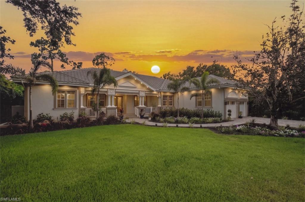Welcome to 24720 Bay Bean Court, a warm and inviting retreat where timeless Old Florida coastal architecture meets sophisticated modern luxury. Tucked away at the end of a private cul-de-sac in Pelican Landing, this exceptional 4-bedroom, 2.5-bath residence offers a rare sense of tranquility and privacy. Sunlight fills the thoughtfully designed interior, highlighting the open-concept layout with new flooring, lighting, and designer ceiling fans throughout. At the heart of the home, the chef-inspired kitchen is a true showpiece, featuring premium quartz countertops with a striking double-thickness edge, a double-banked island offering exceptional storage, high-end Wolf gas range, and all stainless steel appliances. The kitchen flows seamlessly into the breakfast nook and family gathering spaces, showcasing a stunning gas fireplace and custom wine bar. Outdoor living is equally impressive, featuring a spacious screened lanai (2021), private pool and spa, and an expansive covered seating area. Extensively remodeled in 2025 with impeccable attention to detail, recent improvements include new A/C systems (2024 & 2025), a new tankless water heater, reverse osmosis system, water softener, and roll-down hurricane shutters (2021) for enhanced comfort and peace of mind. Beyond the home, Pelican Landing offers an unmatched lifestyle with premier amenities including tennis, pickleball, bocce, a state-of-the-art fitness center, community center, sailing, kayaking and canoeing on Spring Creek, and a private beach park accessible by water taxi. Golf enthusiasts may also explore membership opportunities at The Nest Golf Club. Ideally located near Naples, Southwest Florida International Airport, Coconut Point, Miromar Outlets, and the Gulf's white-sand beaches, this beautifully updated Lakemont residence captures the very best of luxury coastal living. Ready to make this private paradise your own?