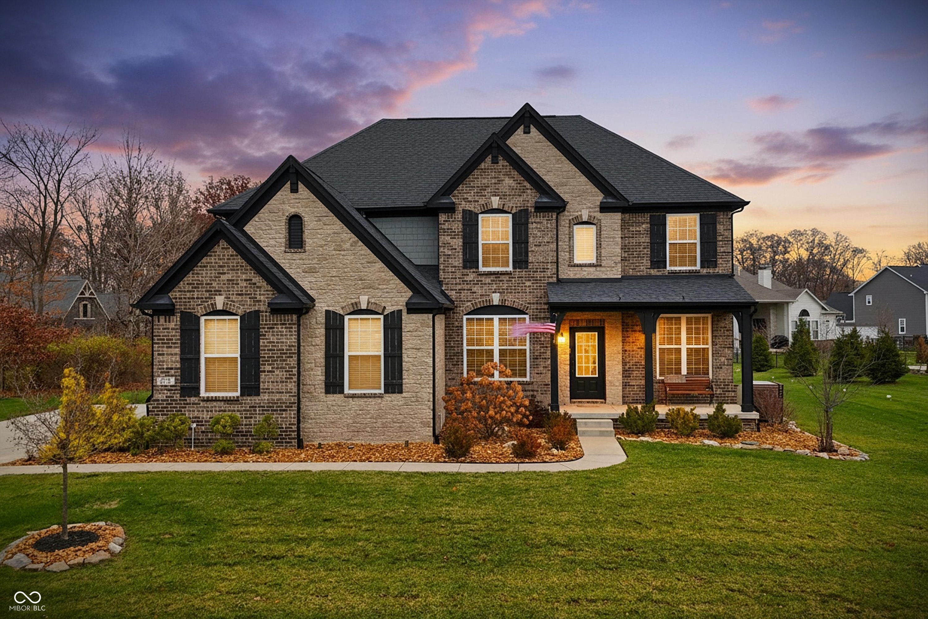 This remarkable Ridge at Flat Forks 5 year old STUNNER has EVERYTHING you're looking for! Situated on a quiet cul-de-sac, and is a testament to modern convenience and shows like a model home. Open concept living at it's finest!  A spacious gourmet kitchen offers high-end finishes and all appliances including washer and dryer, water filtration system are included, ample storage space and soft close cabinets, large center island that doubles as a breakfast bar. High ceilings and large windows enhance the feeling of spaciousness. The cozy family room offers a stone fireplace that will warm you on all those cold winter nights. A Large Dining room and office.  Second floor offers an Owner's Suite that is a true sanctuary, featuring a spa-inspired en-suite bath with separate shower, walk-in closet and double vanities. Three additional bedrooms, full bath, laundry room and a large loft round out the upstairs. The spacious basement includes a Large rec room plumbed for a wet bar, like new pool table which is included. Theater room with high end floor remote rising screen to have all those family movie nights is also included, Unfinished space which can be an additional bedroom but currently being used as storage and work out space. Beautifully landscaped yard with a private covered patio, with fireplace great for all your entertaining needs. So many extras included in this beautiful home. Enjoy the community pool, clubhouse, park. See it today and make it yours tomorrow!