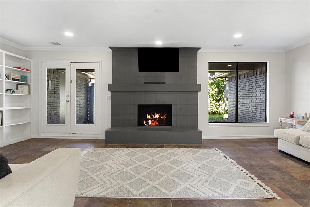 Welcome to an exquisite haven nestled in the heart of Plano at 3625 Candelaria Dr. This pristine residence offers comfort and style, perfectly situated in a prime location with magnificent oak trees gracing the lot. Step inside to discover a rare 4-bedroom, 3-bathroom home featuring an open layout that welcomes you from the moment you enter. Spanning 2,563 square feet, this home is bathed in natural light, thanks to an abundance of windows. The family room serves as the heart of the home, anchored by a sleek, floor-to-ceiling fireplace. The kitchen is well equipped, showcasing shaker-style cabinets, stainless steel appliances, and organized storage. Each bedroom and closet is generously sized for ultimate comfort. The home's thoughtfully curated design includes hand-picked designer lighting, flooring, paint, mirrors, and cabinet and door hardware. The versatile fourth bedroom comes with its own en-suite bath, making it an ideal option for a second primary suite. Outside, enjoy a lifestyle of leisure with a generously sized backyard, an extended patio, and an 8-foot privacy fence. The oversized epoxy garage and NO HOA add to the convenience and appeal of this residence. The home's location puts you just minutes away from Plano's finest amenities, including shopping and dining galore. This home is the perfect blend of elegance and practicality. Don't wait! Schedule a tour today!...