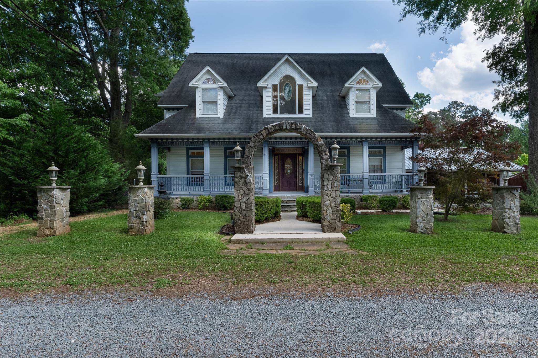 ONE-OF-A-KIND HOME!  This home was built by a very skilled craftsman. The detailed stairway, architectural ceilings, decorative hardwood flooring, and amazing back deck were meticulously designed by the builder who took 6 years to build. Either upstairs bedroom could be the primary suite featuring large ensuite bathrooms creatively designed with garden tubs separate from the showers. The 3rd bedroom is currently staged as a craft room on the main level.  The spacious 2-car garage has a great bonus area(approx 319 sq ft) attached for a game room, separate office, or could be turned into a second living space. Behind the garage is a spacious storage area(approx 187 sq ft) and a covered gravel area that could be great for entertaining. Voluntary HOA fee of only $100 per year gives you access to Boat launch, fishing pier, and swim area. Only 20 miles to Albemarle, 29 to Salisbury, Asheboro, & Lexington makes this the perfect full time home and lake getaway! This house is a must see!