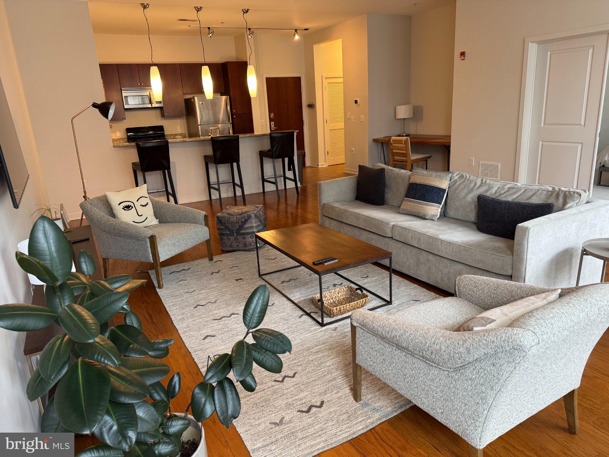 Historic Charm Meets Downtown Luxury in Mount Vernon!   A Must See!Welcome to sophisticated city living in the heart of Baltimore’s historic Mount Vernon! This charming 1-bedroom, 1-bath condo offers a unique blend of character, comfort, and convenience in a beautifully located community. As you walk into the condo, high ceilings immediately catch your eye. The stunning kitchen features granite countertops, stainless steel appliances, a built-in microwave, dish washer and a breakfast bar with seating for three to four guest. Just off the kitchen, you will find a convenient in-unit washer and dryer.Step outside onto your private second-floor balcony and enjoy peaceful courtyard views featuring a beautiful water fountain,  (with future modification into a floral garden) while the impressive oversized fireplace and inviting sitting area create a warm and memorable space to relax or entertain.Residents enjoy an array of desirable amenities, including garage parking,  private storage unit, controlled building access, and a fitness center. And when it comes to location, it’s hard to beat—just a 6 minute walk from Penn Station with easy access to Washington, DC and New York City, and only blocks from the University of Baltimore School of Law, Meyerhoff Symphony Hall, Mercy Hospital, restaurants, museums, coffee shops, and Baltimore’s Inner Harbor.Come discover why Mount Vernon is one of Baltimore’s most distinctive and desirable neighborhoods—and make this exceptional condo your new city home!