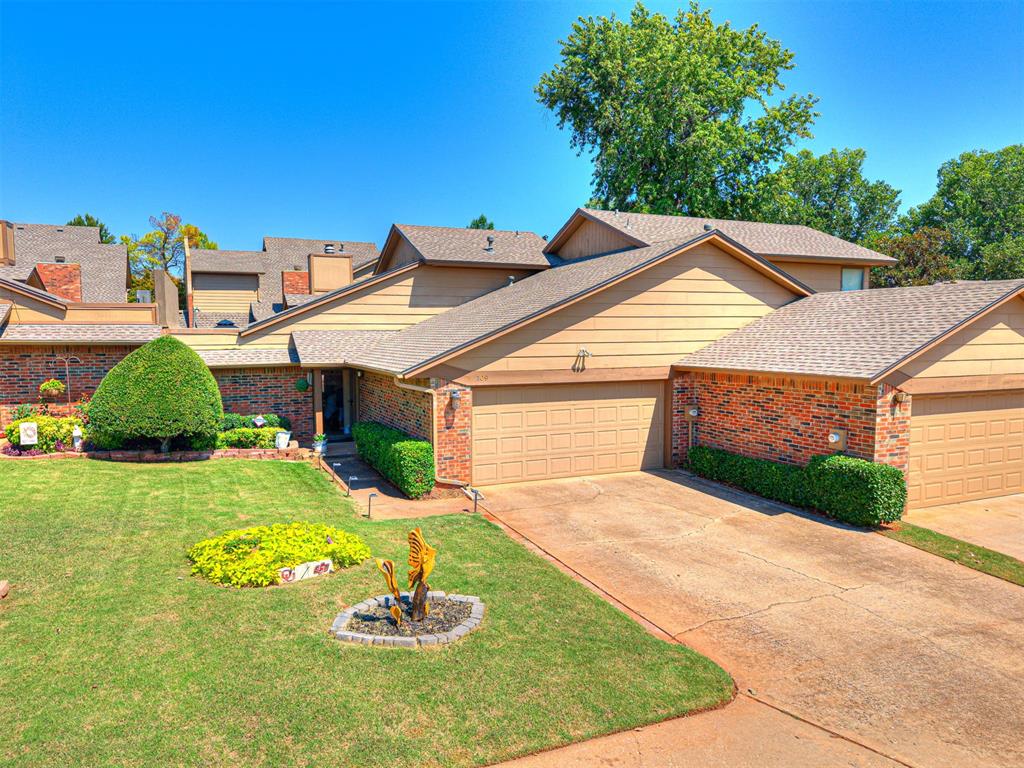 You must see this delightful, low maintenance, freshly painted (outside) and move-in ready home, offering 1218 square feet of entirely usable space, featuring 2 beds, 2 full baths with a large open living, inviting you to relax and enjoy. Plenty of room for cozy conversations by the fireplace or watching your favorite TV show. The true heart of the home is the beautifully remodeled kitchen and dining area—designed for everyday living and entertaining. Picture yourself at the stunning granite breakfast bar, with coffee in hand, or evenings chatting with the “Home Chef” as your meal is being prepared. The Primary Bed with "California Closet" styled walk-in closet and full bath updated with gorgeous tile & spa-like shower completes the first level. Upstairs boasts another spacious bedroom and full bath for a private retreat or guest area.  Out back…lush landscaping surrounds the charming, private outdoor oasis, and patio, ideal for grilling and sunset beverages or a glass of wine under the stars. The 2 car garage is oversized and complete with storage shelving and cedar closets.  If it’s your time to get rid of the mower, this is your place!  The HOA includes front and back mowing. Woodbridge at the Trails is in a prime location, close to restaurants, grocery, pharmacy and everything NW Edmond has to offer.  Don’t let this opportunity pass you by! Owner-occupied homes only.
