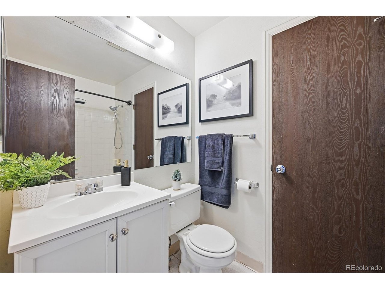 Sweet Lake Arbor townhouse with an oversized attached one car garage AND a designated off-street reserved parking space!  Welcome home to your spacious townhouse with two upper-level oversized bedrooms with vaulted ceilings and double walk-in closets!  Spacious full bath with two sinks!  The main level is enhanced by a wood burning fireplace, a deck and an open kitchen with a convenient breakfast bar!  Half bath for guests makes entertaining convenient.  The lower-level garage has potential for a workshop, cabinets, shelving, your choice, and room to park, no storage issues here!  Room for bikes, kayaks, motorcycle, you name it! How about a pool this summer?  Tennis courts, community garden beds, beautiful grounds and walking areas.  This West Arvada location cannot be beat with walking distance to parks, golf, pickleball shopping and restaurants.  A short drive to Downtown Westminster to enjoy the Alamo, Sweet Bloom Coffee, Famille and Vato's Tacos + Tequilla.  Easy commute to Highway 36 to Boulder or Denver.  Let's talk affordability to be a homeowner instead of rent in this fantastic location.   The Seller is offering a one-year home warranty for your peace of mind AND there is an assumable FHA loan with a 5.625% interest rate.  See me for the details!  Investors:  Looking for your next rental?  This lower than most HOA fee covers a lot and offers so much to a potential tenant.  Either way you look at it, this one makes sense!