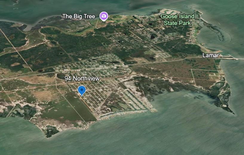 Build your dream bungalow by the bay at 94 Northview, located in the relaxed and welcoming Holiday Beach community next to Lamar, this homesite offers an affordable opportunity to invest or build your own coastal getaway. This area is seeing a wave of new construction and revitalization—don't miss your chance to be part of it! Just down the street, enjoy the community fishing pier with breathtaking Copano Bay sunsets, and take advantage of nearby amenities including the community pool, park, and easy access to Goose Island State Park and the iconic Big Tree. For convenience, there's a nearby stop-and-shop for quick essentials when you're exploring St. Charles Bay by boat.  Bring your flip-flops and imagination—this is coastal living at its best!