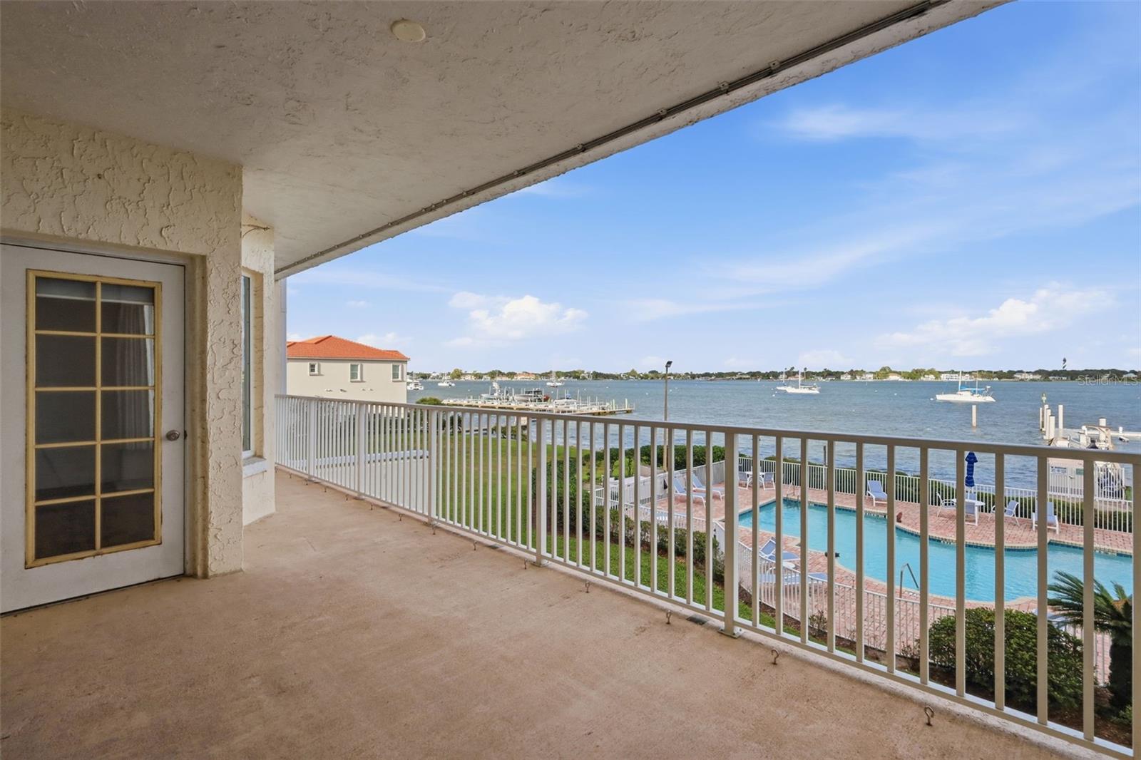 Opportunities like this rarely come along in the heart of downtown! Enjoy breathtaking views of the river, pool, Historic Bridge of Lions, and the iconic St. Augustine Lighthouse from this beautifully updated riverfront condo. Located just one mile from the charm of the Historic District and less than a mile from Flagler College, this property puts the best of St. Augustine right at your doorstep. Inside, coastal charm meets modern comfort with updated flooring, an upgraded kitchen featuring coastal-inspired backsplash and hardware, and beautifully renovated primary and guest bathrooms. The spacious primary suite is a retreat of its own, offering stunning river views, a massive walk-in closet, and a luxurious bathroom complete with a dual vanity, walk-in shower, and jetted soaking tub. The living room also captures incredible waterfront views, creating a beautiful backdrop for relaxing mornings and evenings at home. Step outside to the expansive rear patio, where there's plenty of room to entertain, unwind, and enjoy the evening breeze overlooking the river. An integrated hurricane mesh protection system adds an extra layer of convenience and storm protection for the patio. A brand-new HVAC system installed in June 2026 provides added peace of mind. The gated community features a sparkling pool, professionally maintained landscaping, and a community boat dock with slips available to owners. One assigned parking space in the parking garage is also included. With its exceptional views, thoughtful updates, desirable amenities, and convenient access to downtown dining, shopping, historic landmarks, and waterfront activities, this is a rare opportunity to own a piece of the St. Augustine riverfront lifestyle. These units seldom become available, making this a property you won't want to overlook!