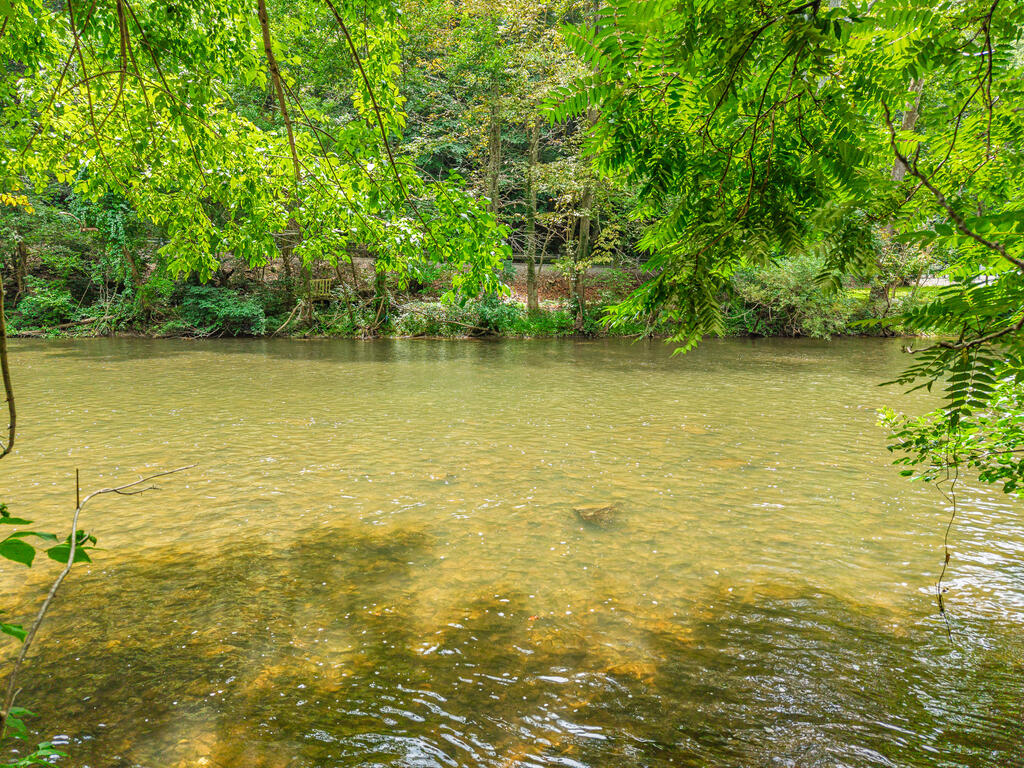 Discover the perfect nature getaway with this secluded 1-acre property featuring direct access to Wolf Creek, offering exceptional fishing and year-round enjoyment. Whether you're dreaming of a private campsite, a weekend escape, or the ideal location to build a cozy cabin, this property provides endless possibilities. Surrounded by nature, you'll enjoy the peace and privacy of a true outdoor retreat without sacrificing convenience. Located just 3 miles from Interstate 77, the property offers easy access while maintaining a secluded feel. Whether you're looking for a recreational property, a future homesite, or an investment in the outdoors, this unique parcel is ready for your vision.