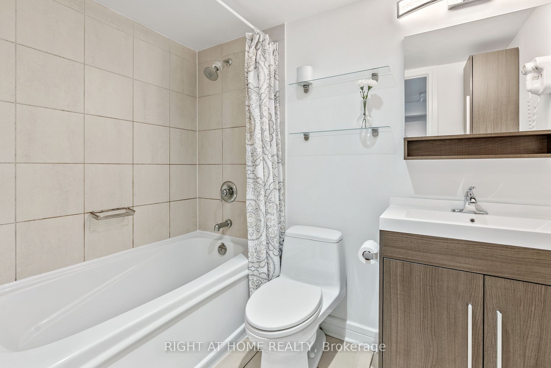 16 Harrison Garden Blvd 209