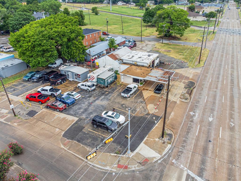Calling all Developers! This commercial property also includes the adjoining unimproved land lot, located in a highly trafficked area on Avenue D just minutes to downtown Garland. Conveniently situated between 5th & 6th Street providing easy entry access, making this property ideal for new development in other business uses. 

Downtown Garland offers a diverse community rooted with culture, arts, incredible food and entertainment at the downtown square. This area includes urban living, creative entrepreneurs and annual holiday community festivals bringing in thousands of visitors to downtown and income generating for the surrounding businesses.

Take a stroll through Garland’s revitalized downtown and see what makes it special

Currently a mechanic repair shop Great for any potential future use. Sale excludes all business equipment, machinery and personal items.

Please contact agent for further information and to schedule a tour! Please do not show up to property without an appointment or disturb employees.