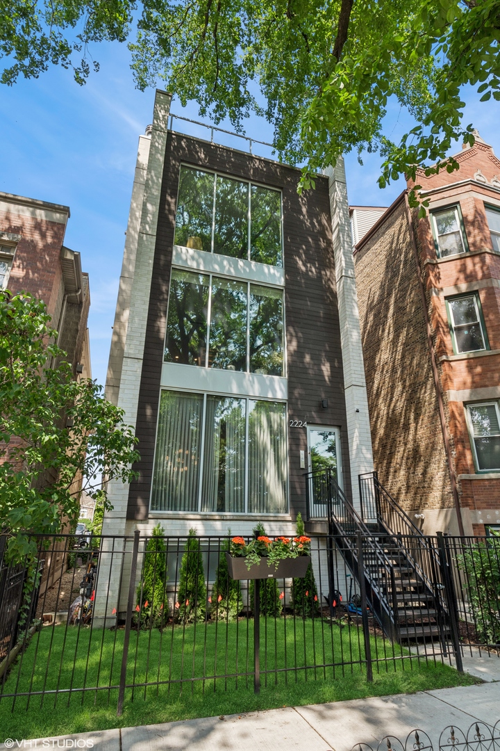 Located in thriving Bucktown, filled with new restaurants and boutique shops, discover a hidden oasis on a quiet, tree-lined street. This stunning 2 bed/2 bath condo is airy, bright, and offers a peaceful, secluded atmosphere you'll fall in love with. This property features a high-end kitchen appliance package, subway tile backsplash with under-mount lighting, quartz countertops on an extended peninsula, pendant lighting, and hardwood floors throughout. The floor-to-ceiling windows allow tons of natural light to come in, yet keep the city sounds out while you're eating breakfast or having a cup of coffee in the designated dining space. The primary bedroom at the rear of the unit has its own Mitsubishi Electric heating/cooling system (separate from the furnace and AC) while offering a serene, quiet setting. Additionally, the bedroom features a walk-in closet and an ensuite primary bathroom with heated floors, a heated towel rack, a dual vanity sink, and a steam shower. Off the primary bedroom is your private and tranquil balcony with a gas line for the grill and easy access to the garage and additional storage closet below. Local amenities include Midtown Athletic Club, Target, Leavitt St Inn, Marianos, Le Bouchon, Tama, Mirra, Map Room, Home Depot, Starbucks, Ed & Gene's, and all the restaurants, bars, and retail stores Damen has to offer. In the middle of everything, yet perfectly your own!