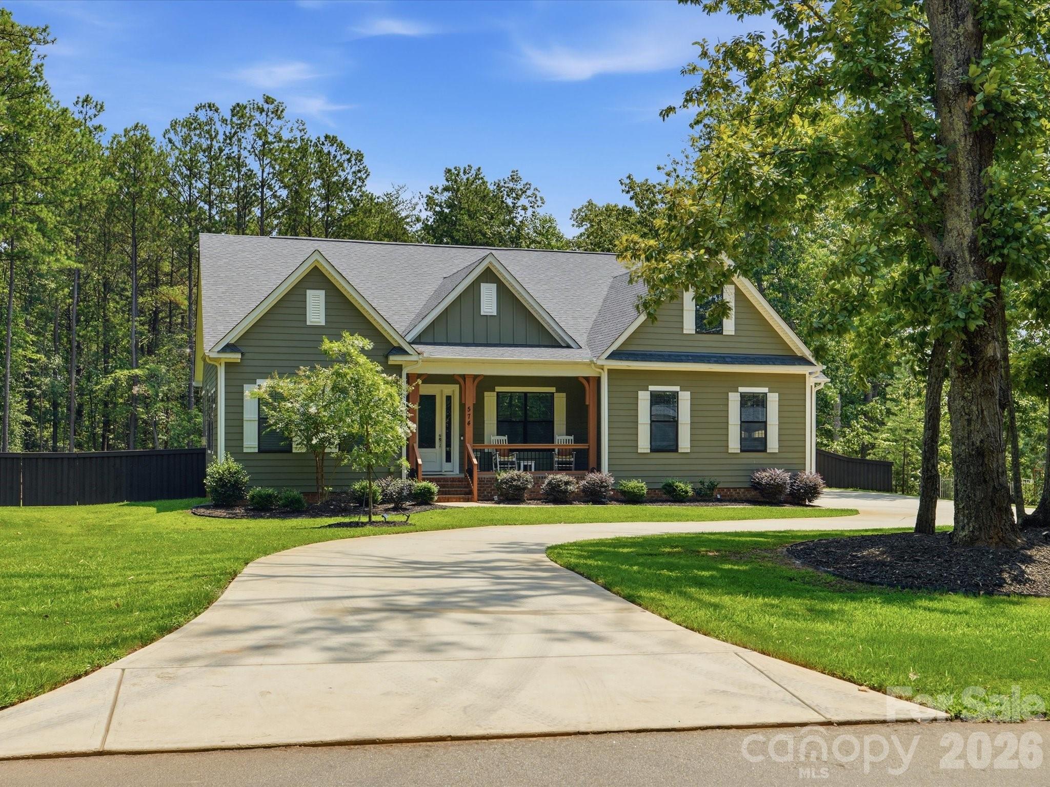 Spacious and thoughtfully designed, this stunning home offers approximately 3,550 heated square feet of comfortable living space with 4 bedrooms, 3 full bathrooms, and an exceptional open floor plan perfect for everyday living and entertaining.The heart of the home features a large living room that flows seamlessly into the gourmet kitchen with a generous center island, custom cabinetry, walk-in pantry, and an inviting breakfast area overlooking the screened porch. Just off the foyer, a versatile Dining Room or Office provides the flexibility to fit your lifestyle, whether you need a formal dining space, home office, or sitting room.The spacious primary suite is privately situated on the main level and features a luxurious en-suite bath with dual vanities, soaking tub, separate shower, private water closet, and an oversized walk-in closet. One of the home's most thoughtful design features is the convenient laundry room with dual access, allowing entry from either the primary suite's walk-in closet or the mudroom for added functionality. Two additional bedrooms and a full bath are also located on the main floor, providing an ideal split-bedroom layout.Upstairs, you'll find a fourth bedroom, another full bathroom, and an expansive loft that's perfect for a media room, game room, playroom, or second living area. Additional walk-in attic storage provides plenty of space for seasonal items and organization.Step outside to enjoy the screened porch overlooking a private, fully fenced backyard, offering the perfect space for relaxing, entertaining, pets, or play. A three-car garage provides ample room for vehicles, storage, and hobbies. More Storage in the fully lined, spacious crawl space.