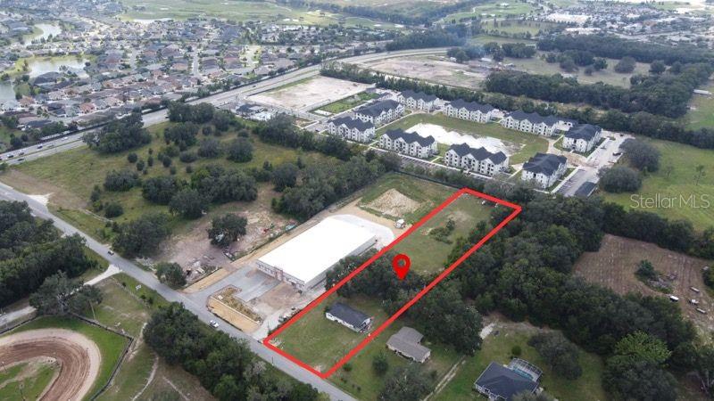 Prime 1.9-acre commercial land zoned C-2 in the rapidly growing market of Fruitland Park, Florida. Surrounded by ongoing development and positioned directly across from a world-famous go-kart track that draws steady traffic during race season, this property offers excellent visibility and long-term growth potential.

The site includes a solid block building, ideal for immediate use as an office or repurposed for other commercial needs. In addition, the property’s zoning and layout allow for outside storage, making it a rare and versatile asset for businesses that need both indoor and outdoor functionality.

Previously utilized as a towing yard, the property is already configured to support a wide range of commercial operations. The block structure is currently undergoing interior renovations, which may be completed prior to sale — or taken over by a new owner to customize to their specific vision.

With ample open land in the rear and flexible C-2 zoning, this property is perfectly suited for contractors, service providers, or investors seeking to capitalize on Fruitland Park’s expansion.