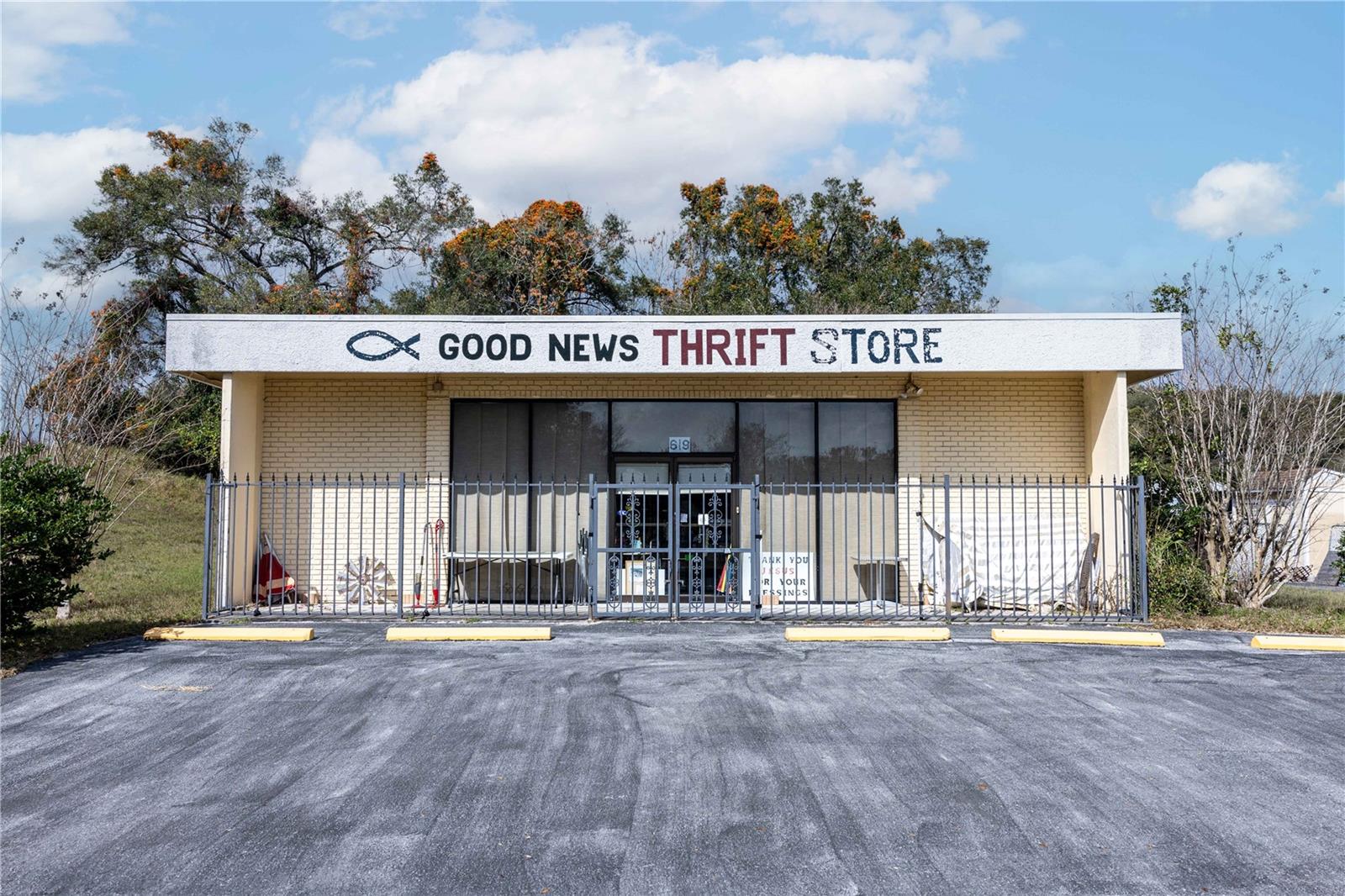 What can be better news than the “Good News Thrift Store” being available for purchase. This well-established property sits on 2.24 acres of prime land with outstanding visibility along two major roadways. Located in Fruitland Park, it offers 300 feet of frontage on N Dixie Ave—directly across from the city sports complex—and an additional 350 feet on US Hwy 27/441 complete with an active billboard generating annual income. Built in 1993 as a robust Dura-Stress structure, the building exemplifies durability using precast, prestressed concrete. This modern construction not only withstands harsh weather but also provides excellent protection against fire and vandalism, while offering architects and developers the flexibility to design with confidence.The 3,320-square-foot clearspan building features exceptional energy efficiency, cold air conditioning, and two bathrooms. A parking lot accommodating over 10 vehicles, with plenty of room for expansion, further enhances the property’s appeal. Utilities are well-supported with city water and sewer services through Fruitland Park (currently operating off an existing septic system) and electricity provided by the City of Leesburg.Priced to sell, this property won’t be on the market for long. Contact me today for more details or to schedule a viewing.