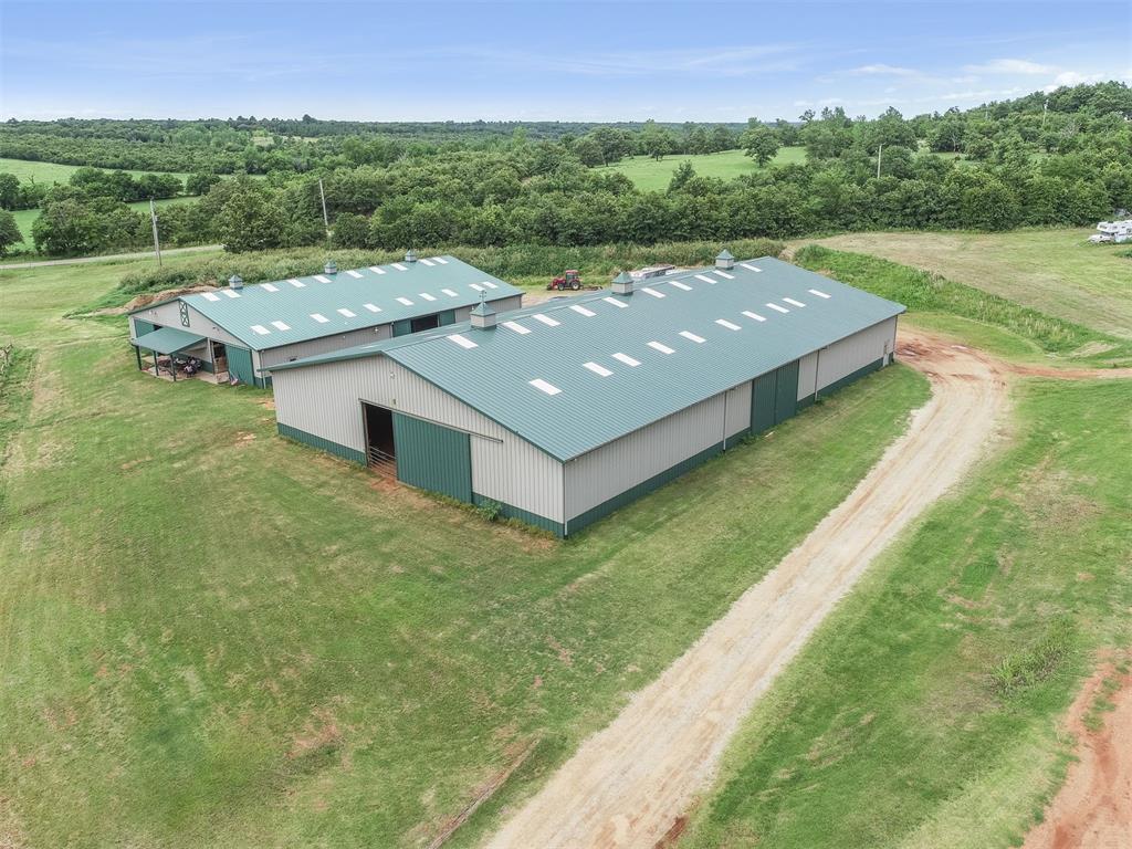 40 ACRE PROFESSIONAL HORSE BOARDING!! **Or subdivide and build homes on 10 acre lots. Scenic land with views, ponds and mature trees.** 2013 Morton 20 Stall Horse Barn. Morton 80' x 140' Indoor Arena. Morton 40' x 60' Shop with Heated and Cooled Office and bathroom. Morton 40' x 50' hay barn. MANY Fenced Paddocks and Pastures. * ADDITIONAL 40 ACRES AVAILABLE. OWNER MAY CONSIDER SELLING 50 ACRES WITH NO STRUCTURES.*