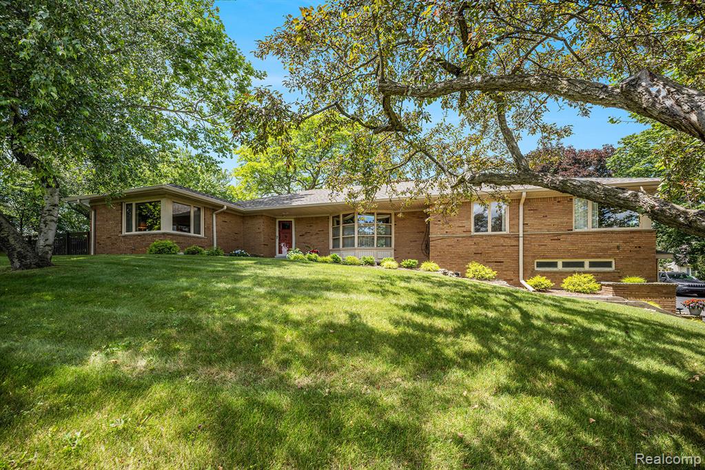 Welcome to 6400 N. Rochester Road — A one-of-a-kind property featuring TWO distinct buildings on 5.2 scenic acres — the main residence and a charming barn with living space! a rare and remarkable mid-century modern home just minutes from downtown Rochester. This 4-bedroom, 2 full and 2 half bath custom-built residence was designed with entertaining in mind. The spacious layout features large windows, open-concept living and dining areas, a second kitchen and wet bar, slate flooring and multiple fireplaces.
Enjoy the unique atrium with live trees, built-in pool and whirlpool, and the charming barn with a studio kitchen and attached garage — ideal as a guest house or creative retreat. Recent updates include a new roof (2023), whole-house generator, below-ground electric (2022), new landscaping, and resurfaced driveway (2025). A true one-of-a-kind property filled with history, character, and potential — all just 3 minutes from Rochester’s shops and restaurants.
This is more than a home — it’s a private estate with space to grow, create, and relax.