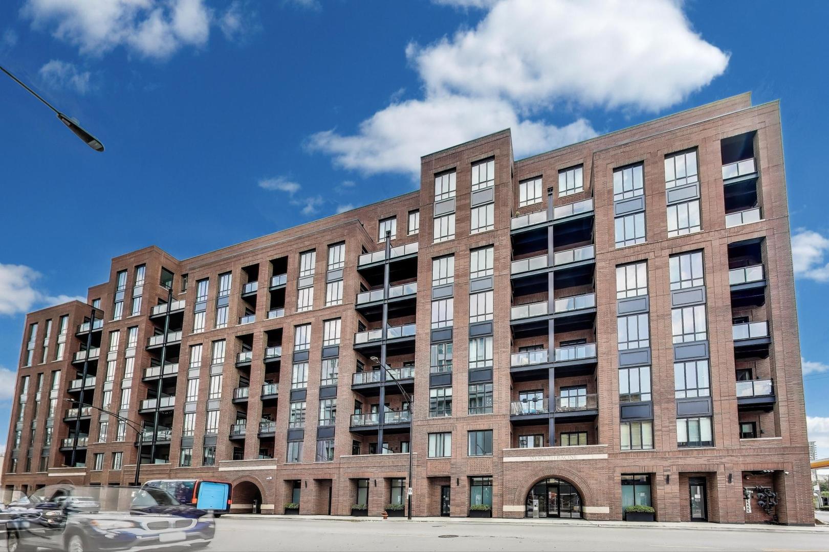 Elevated luxury meets unparalleled craftsmanship in this stunning, like-new Belgravia 3 bed plus a den, 3 bath residence, perfectly situated in the heart of Chicago's vibrant West Loop. This expansive 2,160+ sq ft corner condo welcomes you with soaring 9-foot ceilings and floor-to-ceiling windows that flood the space with natural light, highlighting beautiful wide plank oak hardwood floors flowing seamlessly through the formal dining room, expansive living room, and chef's kitchen.    The kitchen is a true showstopper, featuring custom Melamine Patrae cabinetry, quartz countertops throughout-including a dramatic waterfall island-full-height backsplash, and top-tier Bosch stainless steel appliances, including a 36" paneled French door refrigerator with bottom freezer, under-cabinet lighting, a built custom pantry, a built-in wine fridge integrated into the kitchen island, premium Wolf stove/oven combo, and a Franke Ambient kitchen faucet.    Retreat to the expansive primary suite featuring two large walk-in closets, a spa-like bathroom with dual vanities, upgraded quartz counters, an oversized walk-in shower with bench and trendy hexagon tile, a separate water closet, and a private balcony offering breathtaking views of the iconic Chicago skyline. Two additional spacious bedrooms each boast en suite bathrooms and ample closet space. A custom built fully enclosed den/office provides an ideal workspace for remote days or study.  Every upgrade in this unit reflects the highest level offered by the developer, totaling over $189,000 in premium upgrades.  Personal touches include custom closets crafted by Chicagoland Home Products, elegant living room built-ins, a fully built out office, an entry cabinet, custom drapes by Everhem, and blinds by Blinds Gallery, Grohe handheld showers in all three bathrooms. Thoughtful details such as canned lighting throughout living and bedrooms, J boxes for future tech in every room enhance comfort and convenience. Additional finishes include an LG washer/dryer (purchased end of 2022) with side-by-side units set on stylish tile flooring in spacious laundry room.    This exceptional home offers two private outdoor spaces perfect for entertaining or unwinding, plus one heated garage parking space. Residents enjoy access to a fully equipped fitness center, meeting room, bike storage, secure video entry, and package rooms. Gas and hot water are included in the HOA.    Perfectly positioned just steps from Mary Bartelme Park, the West Loop's renowned Fulton Market restaurant row, Whole Foods, Mariano's, Target with a full grocery store next door, Greektown, boutique shops, and with effortless access to the Blue Line and 290 expressway, this residence combines luxury and convenience. Located within the highly sought-after Skinner School District.  Healthy building reserves, no current or planned special assessments, no rental restrictions.  This home represents a rare opportunity to live in West Loop's finest.