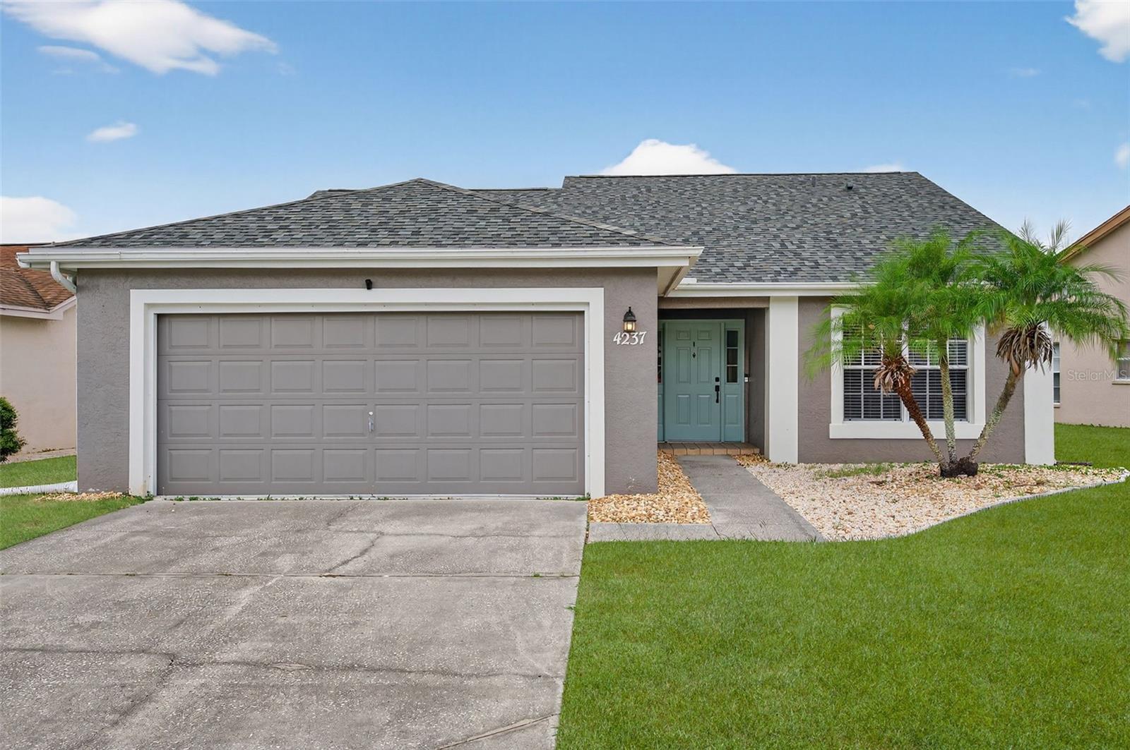 Are you ready to be WOWED? This GORGEOUS, TURN-KEY home is sure to impress! With 1,555 square feet, this 3 bed, 2 bath, 2 car garage home has been PROFESSIONALLY REMODELED and boasts BEAUTIFUL NEW OPEN LIVING SPACE! You’ll absolutely fall in love with the STUNNING kitchen with its GRANITE COUNTERTOPS, UPDATED CABINETRY, NEW HARDWARE, NEW CUSTOM PANTRY, and STAINLESS APPLIANCES. You'll appreciate the SPACIOUS FEEL of the home with its cathedral ceilings, and you’ll love how the large living space opens up into your fully enclosed BEAUTIFUL FLORIDA ROOM, complete with gorgeous stone flooring! The list of FABULOUS UPDATES on this home continues with a NEW ROOF (2024), NEW HVAC SYSTEM (2025), NEW SUNSHADES (2024), NEW KITCHEN & DINING LIGHTING (2024), and NEW LVP FLOORING (2024) throughout the home! The generously sized primary suite includes a private entrance to the Florida room, a large WALK-IN CLOSET, and an UPDATED primary bath complete with WALK-IN SHOWER. The secondary bedrooms are located near the front of the home adjacent to the UPDATED hall bath, and one of them offers convenient double door entry and could easily be used as a den or office. The living areas and bedrooms feature updated overhead ceiling fans and lighting. You’ll be delighted to discover that there’s no need to go into the garage for your laundry – you’ll find the washer and dryer (complete with pedestals) conveniently housed right inside the new pantry! The attached 2-car garage features NEW BUILT-IN SHELVING for storage and a convenient side door. The Millpond Estates community is beautifully maintained and boasts a SPARKLING POOL/SPA, Clubhouse, Fitness Center, and offers many fun activities. There is NO CDD, and the reasonable HOA monthly fee includes Cable TV, Internet Access (Spectrum WiFi), and more. Ideally located close to local shopping, restaurants, and Florida’s world famous gulf beaches, you do not want to miss this opportunity! Schedule your private showing today!