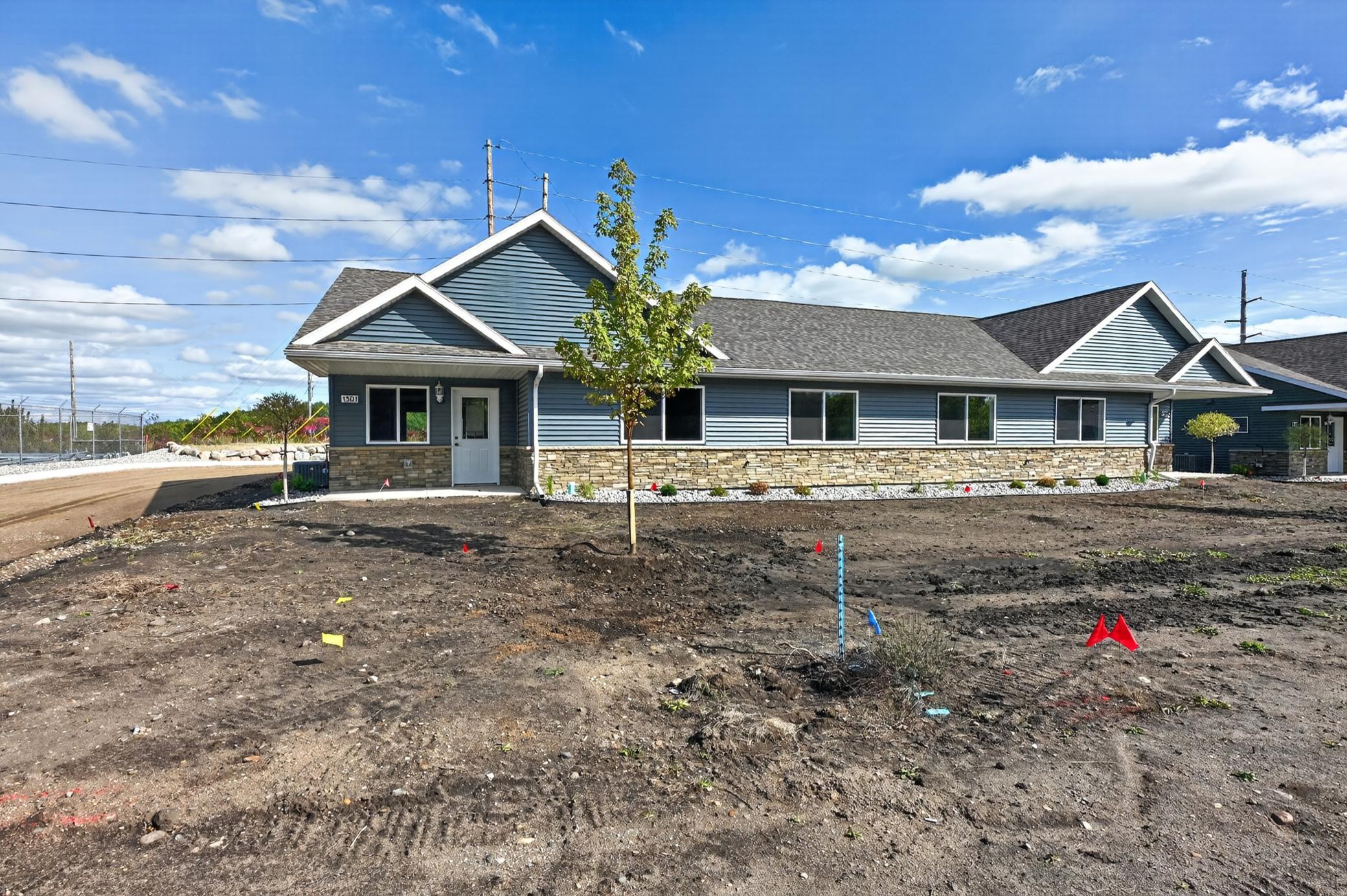 NEW CONSTRUCTION + AFFORDABLE HOMEOWNERSHIP! Don’t miss this opportunity to own a brand-new 2-bedroom, 1½-bath townhome featuring an inviting open floor plan, city water and sewer, and a 2-stall attached garage. Enjoy easy living with lawn care, snow removal and garbage included in the association dues. Plus, with available secondary financing, there is an opportunity for qualified buyers to have a loan amount on this property as low as $282,900, subject to buyer qualification and lender approval. Close to downtown, shopping and schools, this could be the opportunity you’ve been waiting for to make homeownership a reality! All buyers must meet applicable income guidelines.
