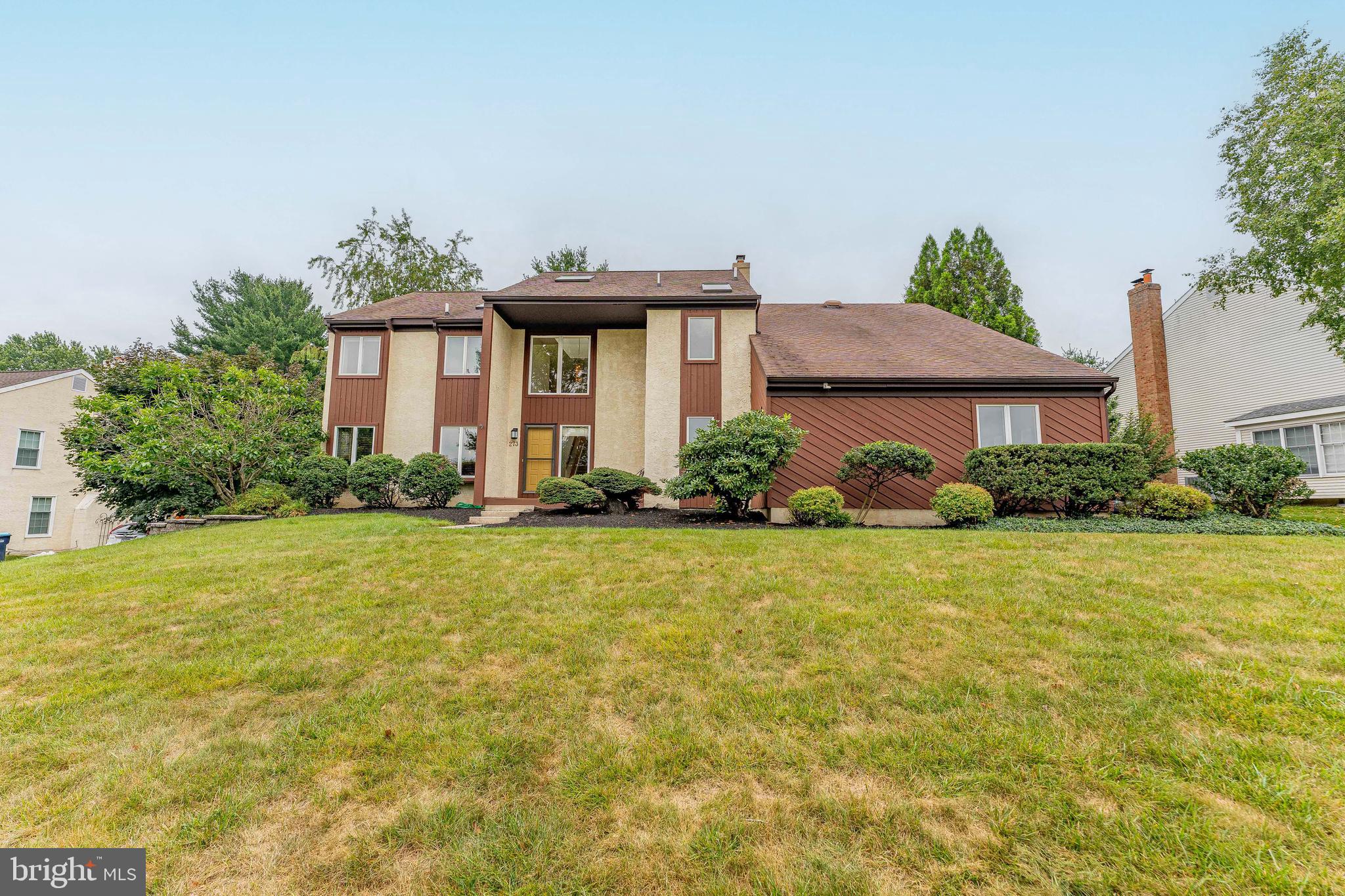 Welcome to 273 Spring Run Lane, a 4-bedroom, 2.5-bathroom single family home in the desirable and family-friendly Arbordayle community, part of the Downingtown School District. Conveniently located near the PA Turnpike, RT 202, and RT 100, you can travel to King of Prussia, West Chester, Malvern, or Phoenixville all within 15 minutes! This contemporary home offers spacious living areas, thoughtful architectural details, and an inviting outdoor setting, this home is designed for comfortable everyday living and entertaining. As you approach the newly-painted home, you'll be welcomed by a beautifully maintained front yard, a 2-car garage, and a spacious driveway with parking for two additional vehicles. Step inside to a dramatic two-story foyer featuring a chandelier, skylight, and abundant natural light. To the left, the sunken living room provides a cozy space to relax with carpeting and a beautiful chandelier. The adjoining dining room features carpeting, crown molding, chair rail detailing, and an open entry to the kitchen, making it ideal for both everyday meals and special occasions. The heart of the home is the expansive kitchen, showcasing hardwood floors, granite countertops, a center island with a prep sink and seating, a double corner sink with garbage disposal, stainless steel appliances including a refrigerator, propane gas cooktop, electric oven, and range hood. The adjoining breakfast room is a standout space, featuring vaulted ceilings with exposed beams, a skylight, hardwood floors, a bay window overlooking the backyard, a dry bar with a wine refrigerator, open shelving, a huge walk-in pantry, and sliding glass doors leading to the patio. Just off the kitchen, the spacious family room features carpeting, recessed and track lighting, a ceiling fan, and a striking wood-burning fireplace with a mantel and accent wall, creating a warm and inviting gathering space. A conveniently located powder room and mudroom with a built-in bench, garage access, and washer and dryer hookups complete the main level. Upstairs, the spacious primary suite offers carpeting, a ceiling fan, a walk-in closet, and a linen closet. The en-suite bathroom includes tile flooring, a double sink vanity with dressing area, a jetted soaking tub, and a separate step-in shower. Three additional bedrooms, each featuring carpeting, ceiling fans, and double windows, provide comfortable accommodations for family, guests, or a home office. A full hall bathroom with tile flooring, double sinks, a skylight, recessed lighting, and a built-in linen closet completes the upper level. The finished basement expands the home's living space with a large recreation room featuring carpeting, recessed lighting, a ceiling fan, and windows that bring in natural light. An adjoining section provides space for hobbies or fitness equipment. The large unfinished section includes the washer and dryer,  a second refrigerator, a deep freezer, a workbench, heavy-duty shelving, and ample storage space. Outside, the spacious patio and private backyard provide the perfect setting for outdoor dining, entertaining, gardening, relaxing, or enjoying time with family and pets. Conveniently located near local shopping, grocery stores, restaurants, Marsh Creek State Park, and major commuter routes, this home offers the perfect combination of space, comfort, and convenience. Don't miss the opportunity to make 273 Spring Run Lane your next home!