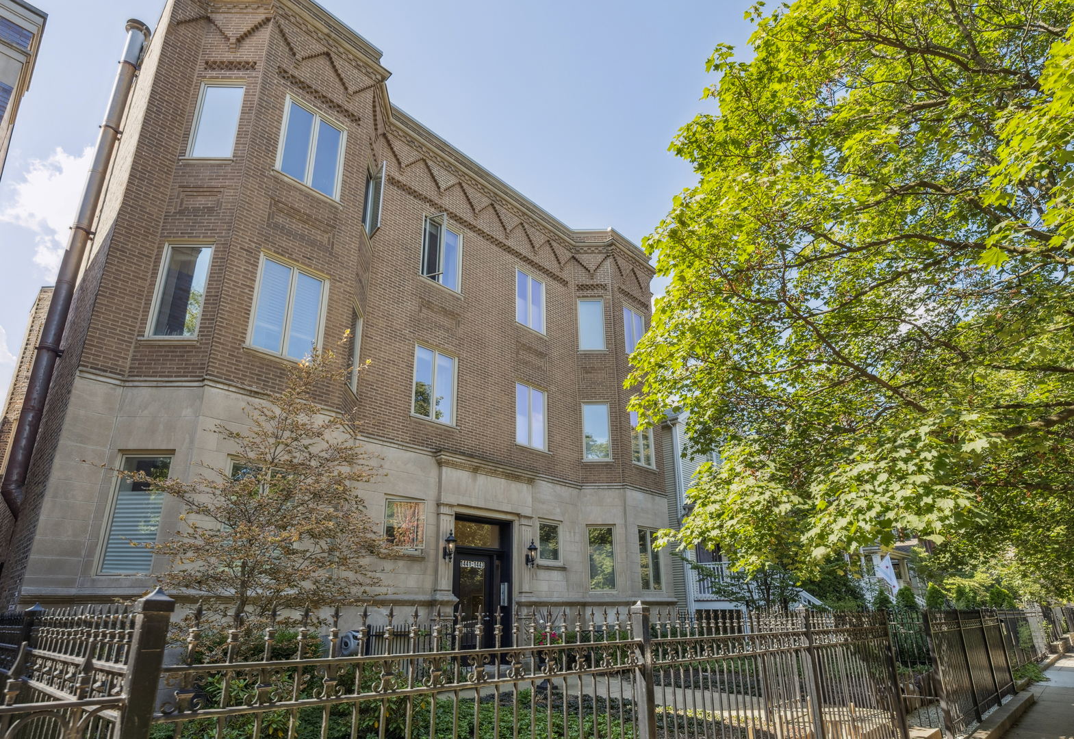 Welcome home to this charming, sunlit two-bedroom, two-bath plus den condo in Graceland West. You'll fall in love with its whimsical finishes and urban feel, highlighted by beautiful exposed brick. The versatile floor plan offers multiple living spaces, including a dining room right off the kitchen-a perfect setup for entertaining. The kitchen is a standout with its stainless steel appliances and leathered marble countertops. Retreat to the primary suite, which features a spacious en-suite bath and a walk-in closet. Other notable features include a gas-burning fireplace, in-unit washer and dryer, and one parking space for the car you will never need while living here. With a prime location that's just a short walk from the L train, shops, restaurants, and grocery stores, you'll find yourself exploring everything the Southport Corridor has to offer. Feeling nostalgic, grab your cone at the DQ and walk a little further for a Cubs game! This is Chicago living at its best!