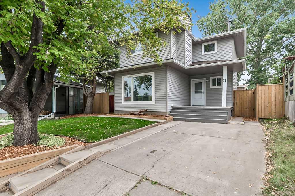 This home is a must see, located on a quiet street backing onto a greenspace in Castleridge, and only blocks from schools, shopping and the great amenities of Prairie Winds Park - perfect for your family! As you walk through the home you can sense the love and warmth it offers your family. The entire home finishings were updated within the last 5 years including kitchen cabinets, concrete countertops, new vinyl plank and tile floors, all trim and doors, paint, and bathrooms. Be welcomed into a HUGE living room that can accommodate any seating or entertainment set up you need, along with space for a desk too! The big bright windows allow light to flow through and fill the main floor with natural light. Continue on to the spacious, functional, custom kitchen with great storage and new stove (2024). The eating bar counter is open to the dining nook which has sliding patio doors leading to a large deck, making the space perfect for entertaining or quiet relaxation in your large private yard on a pie lot. Whether it's the back deck or the covered front porch, this home offers peaceful outdoor spaces to enjoy with family and friends. Watch the kids play in the yard, or gardeners can take advantage of the raised garden boxes, a greenhouse, and fruit-bearing saskatoon bush and grape vine. The main floor also offers a 2 piece powder room for your guests to the right of the front door. After taking the staircase, which has updated metal spindle railings, on the second floor you'll find the main 4 piece bathroom and two bedrooms for the kids, before you get lost in the spacious primary bedroom! In the basement, you'll find a large family room great as an TV or entertainment room including an office area with built in desk. Another flex room would be perfect as a gym, hobby or play space or guest room (non-egress window). There is an unfinished storage area and bright laundry room thanks to a window, with newer washer and dryer from 2023 and water tank from 2017. Additional storage can be found below the stairs. There is ample street parking on top of the tandem driveway with space for two vehicles. With this home, you can relax knowing the fence, siding, eaves and windows were done in the last 4 years, and the roof only 10 years ago. The porch and deck were refinished in 2025 and the landscape was spruced up with fresh bark mulch as well. Book your showing soon, this great home won't last long!