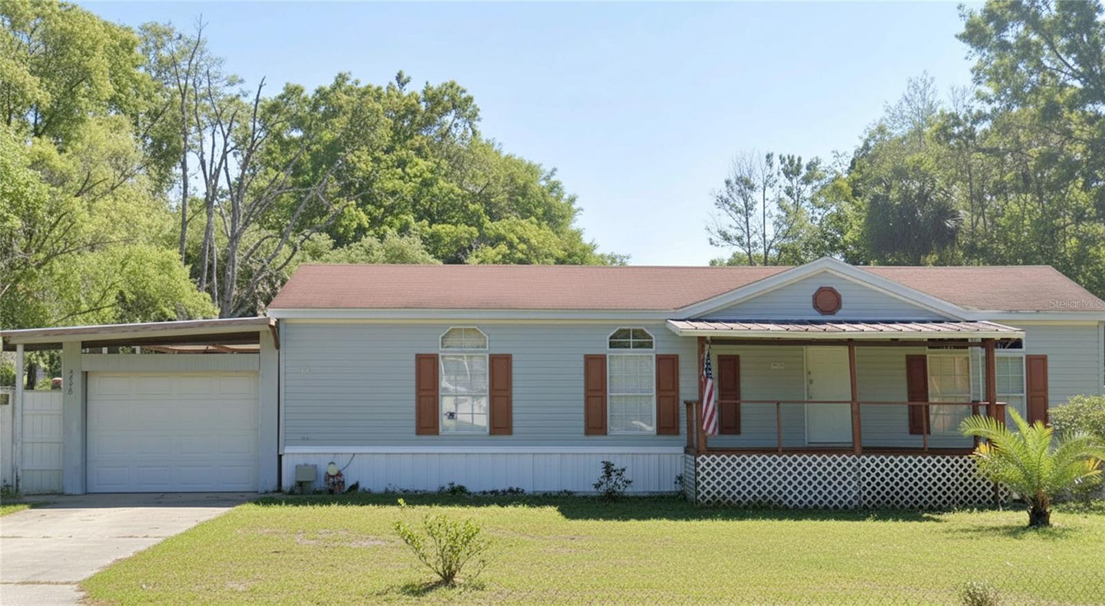 Welcome to 5950 Woodsman Dr, a spacious 3-bedroom, 2-bathroom manufactured home built in 2001 and situated on an expansive 1.01-acre lot in Wesley Chapel. Offering plenty of land and flexibility, this property provides room to enjoy the Florida lifestyle, create outdoor living spaces, garden, park recreational vehicles, or simply appreciate the extra privacy and elbow room. Conveniently located in Pasco County, you’ll be close to Wesley Chapel’s popular shopping, dining, entertainment, and recreation, including The Shops at Wiregrass, Tampa Premium Outlets, Epperson Lagoon, Wesley Chapel District Park, and AdventHealth Center Ice. With its generous lot size, functional 3-bedroom layout, and convenient location, this home is an excellent opportunity for buyers looking for space and accessibility in the growing Wesley Chapel area. The property is located in FEMA Flood Zone X, generally considered an area of minimal flood hazard. Don’t miss the opportunity to make this spacious property your own!
