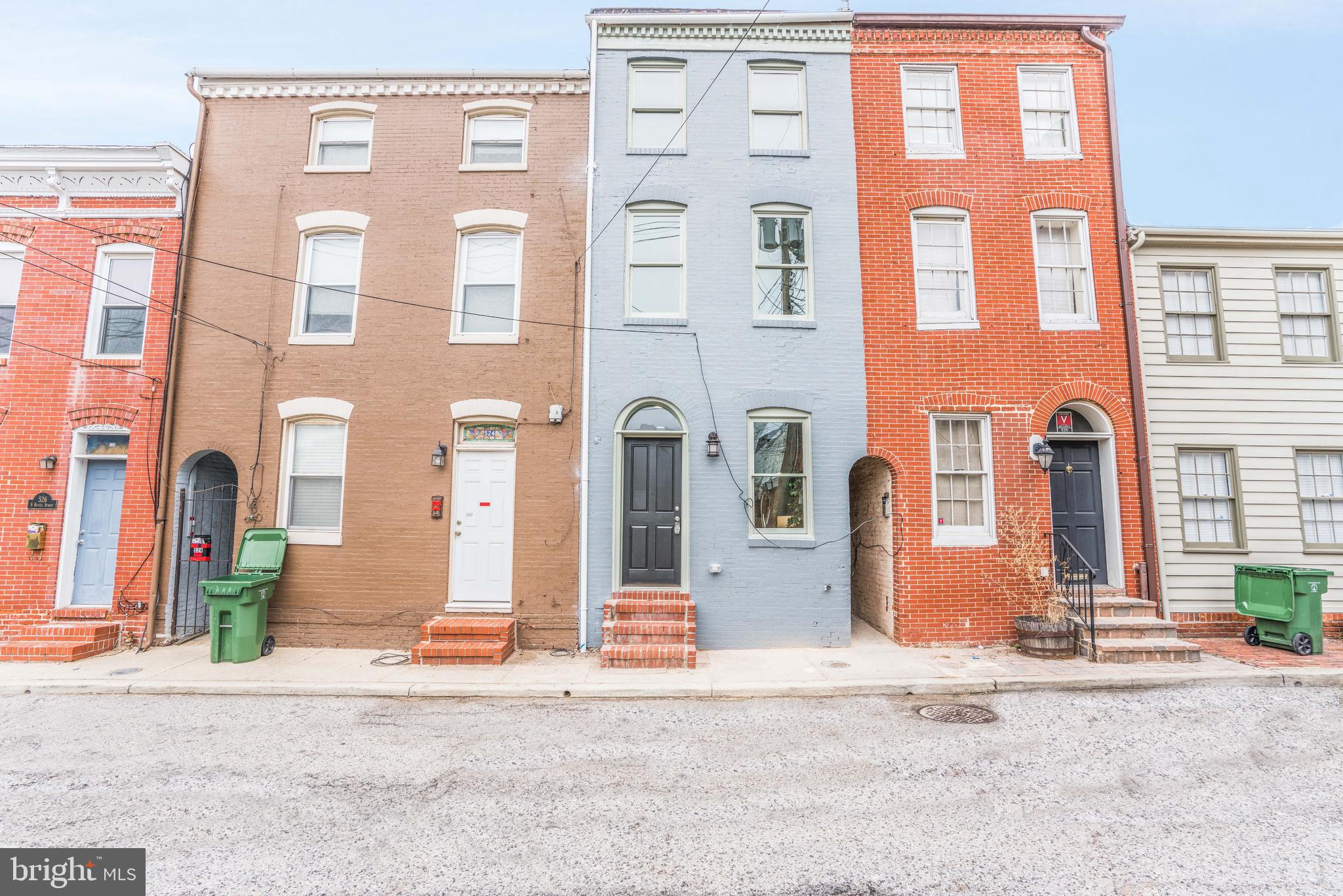 Charming Row Home in convenient Fells Point Corridor awaits!!  Convenient access to downtown and Hopkins Hospital from this gem of an address."This home features 3 beds and 3 full baths with 2 primary suites. Main floor offers a living area and an updated kitchen with access to an enclosed patio. Second floor has one of two primary suites with an ensuite, as well as laundry, a second full bath, and a guest bedroom. Third floor offers the second primary suite with a bathroom, a living area with a wet bar and two skylights. Access to roof top deck is through hallway on third floor.  This home offers the perfect blend of charm and modern convenience. Featuring hardwood floors throughout, an open-concept living and dining area, and a modern kitchen with stainless steel appliances and granite countertops.Additional Features:Central A/C and heatingIn-unit washer and dryerAmple street parkingPet-friendly (with deposit)Walking distance to restaurants, shops, and Camden YardsDon’t miss the chance to live in a neighborhood filled with Baltimore charm and culture. Schedule your tour today!