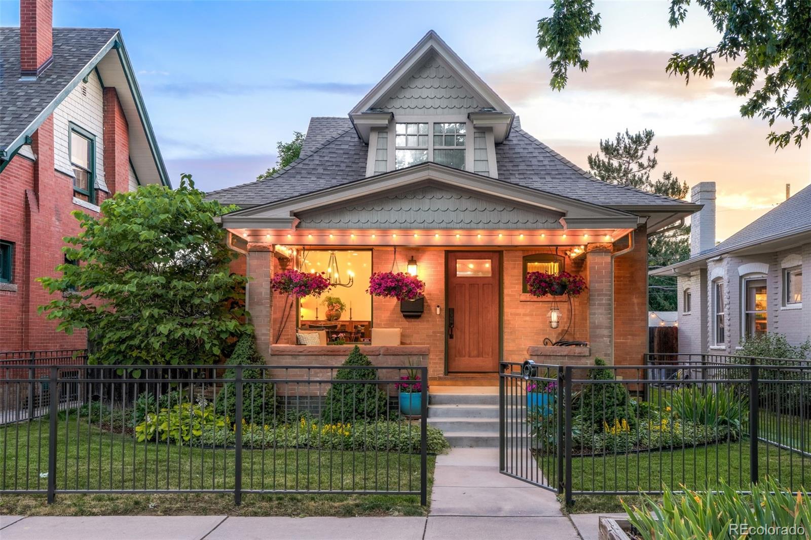 A rare find in West Wash Park — this fully gutted and reimagined residence delivers a level of craft and intention that's nearly impossible to replicate today. Completed in 2013 by Synergistic Development with no detail overlooked, the home was rebuilt from the studs out: spray foam insulation attic to basement, dual-zone HVAC, individually controlled water lines, Cat-5 wiring throughout, and built-in speakers. The heart of the home is an expansive great room with soaring ceilings that opens directly to the professionally landscaped backyard — a seamless indoor-outdoor connection that is genuinely rare for the neighborhood. A gas fireplace anchors the space, while mature plantings and a tranquil water feature make the backyard feel like a private urban retreat.The chef's kitchen is outfitted with new high-end appliances and a charming eating nook with built-in bench seating. The primary suite is a true retreat — vaulted ceilings, generous walk-in closet, steam shower, dual vanity. A second upper-level en-suite offers exceptional privacy. Two flexible main-level bedrooms and a finished basement with serious storage complete the picture.Outside: drip irrigation front and back, an oversized two-car garage with space to park two SUVs., epoxy floors, workbench, and utility sink plumbing. Be sure to note the decorative and functional sliding doors on garage.  Upgrades made from 2021 - 2026: Custom mudroom built-ins, all new kitchen appliances (Wolf dual fuel range, Zephyr hood, Bosch refrigerator and dishwasher), custom walnut barn door for the main-floor guest suite, solid white oak front door with seeded glass transom, Cisco Home dining chandelier, and custom window well cover with interior lock. Steps from Washington Park, Whole Foods, Wash Perk Coffee, and everything that makes this neighborhood one of Denver's most sought-after.  This is Wash Park done right!