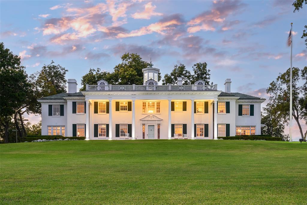 Dallas Landmark Mount Vernon on 10 premier acres overlooking White Rock Lake. The Main Home is 10,511 sqft totally renovated and expanded in 2002. Elevator accesses to 3 Levels, including the 2,400 sqft Basement and Wine Storage. Renovated outbuildings include two story Guest House, Pool House, 4 lane Bowling Center, 16 Car Concours Classic Auto Facility, Lighted Tennis Courts, Heated Pool, Putting Greens, Gazebo, Outdoor Grill, 2 Fireplaces and Pizza Oven.
