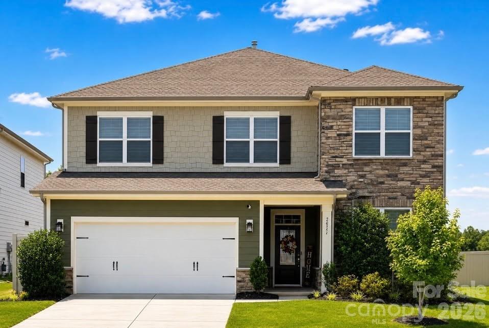 Welcome to this fabulous Weddington Pointe home! This home truly has it all, featuring new luxury vinyl plank flooring on the main level and fresh paint throughout. The property offers incredible flexibility with a 5th bedroom on the main level, complete with a walk-in closet and access to a full bathroom—perfect for a home office or guest suite. The gourmet kitchen is a chef's dream, featuring 42" cabinets, granite counters, an oversized island with a breakfast bar, and stainless steel appliances, including a gas range and double oven. Please note that the upgraded, state-of-the-art refrigerator is included with the home.The spacious living room has a gas fireplace and abundant natural light. Upstairs, the large primary bathroom features separate vanities, garden tub, tiled shower, and a massive walk-in closet. Other highlights include 3 additional bedrooms, all with walk-in closets, plus a large loft and tiled laundry room featuring an upgraded Samsung washer and dryer, which are also included. Entertain, relax or play the giant, level backyard fully enclosed with a white vinyl privacy fence. The Weddington Pointe neighborhood offers wonderful amenities, including a clubhouse, outdoor pool, and playground, all within walking distance. This home is just minutes away from the shopping and dining at Wesley Chapel Village Commons and Sun Valley Commons.PROFESSIONAL PHOTOS WILL BE UPLOADED on 7/1. Please let me know if you would like to schedule a time to come see this fabulous home.